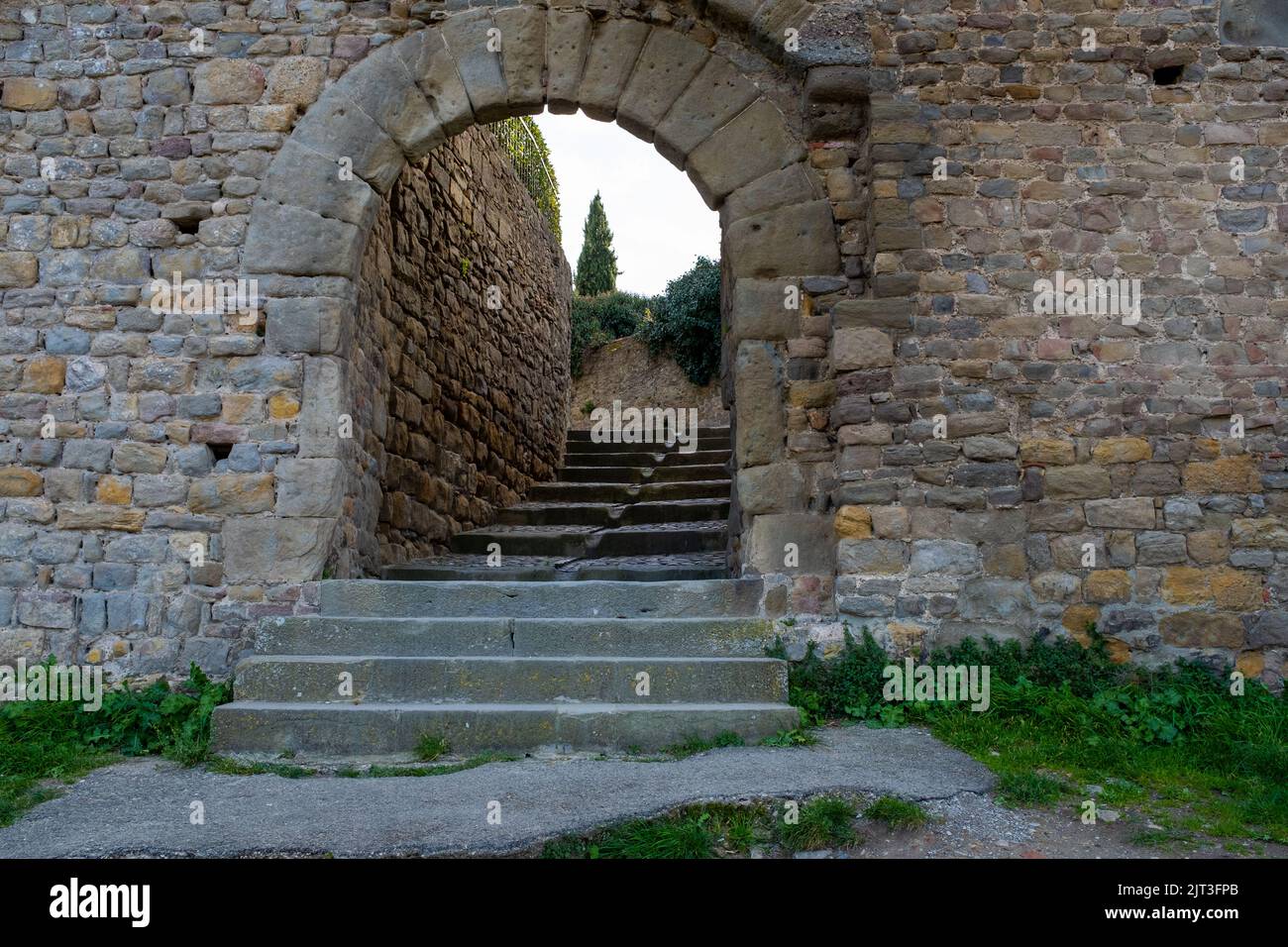 Gate to the medieval city of Carcassonne in winter with no people, taken at the end of the afternoon Stock Photo