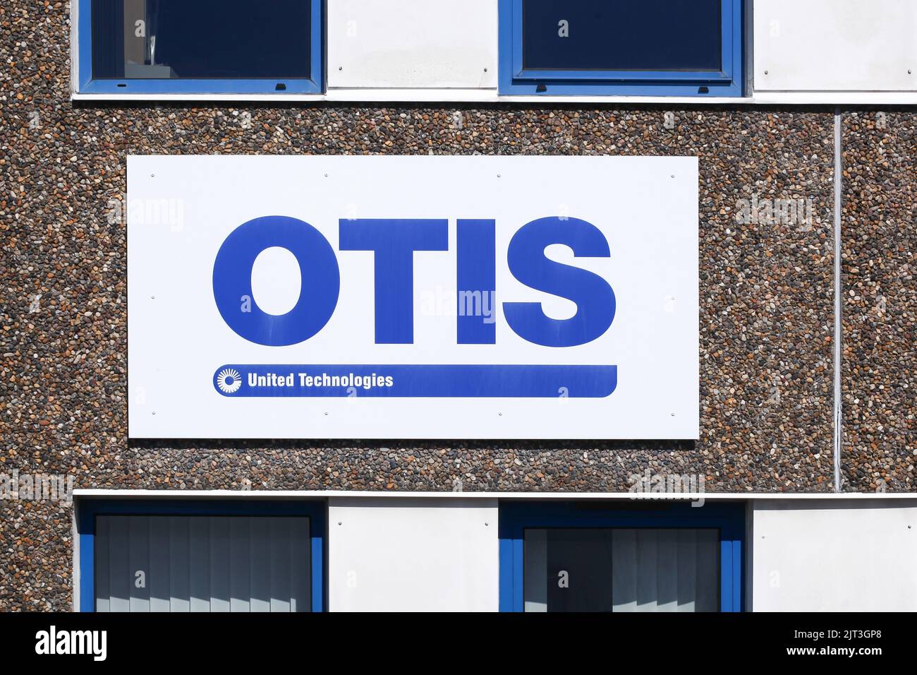 Viby, Denmark - April 17, 2022: Otis logo on a wall. Otis is an American company that develops, manufactures and markets elevators, escalators Stock Photo