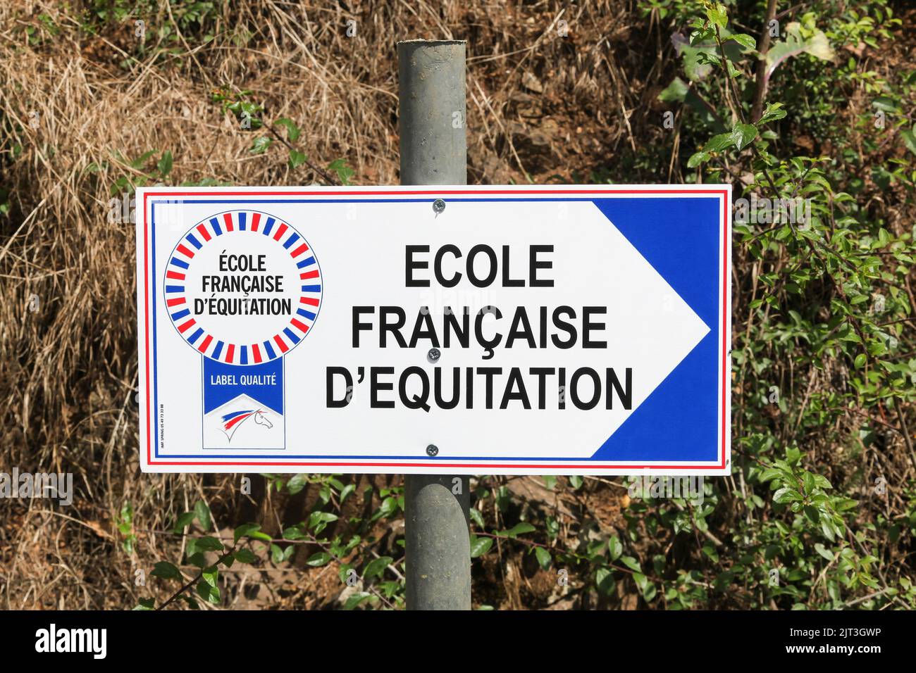 Legny, France - June 20, 2020: French riding school signpost called ecole francaise d'equitation in French language Stock Photo