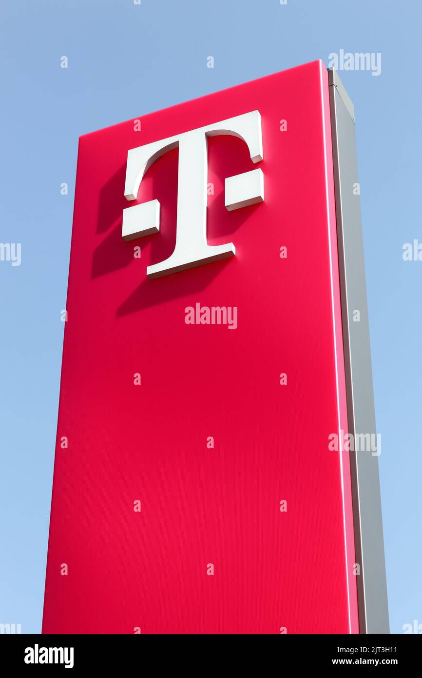 Cologne, Germany - September 2, 2018: Deutsche Telekom sign on a panel. Deutsche Telekom is a German telecommunications company Stock Photo