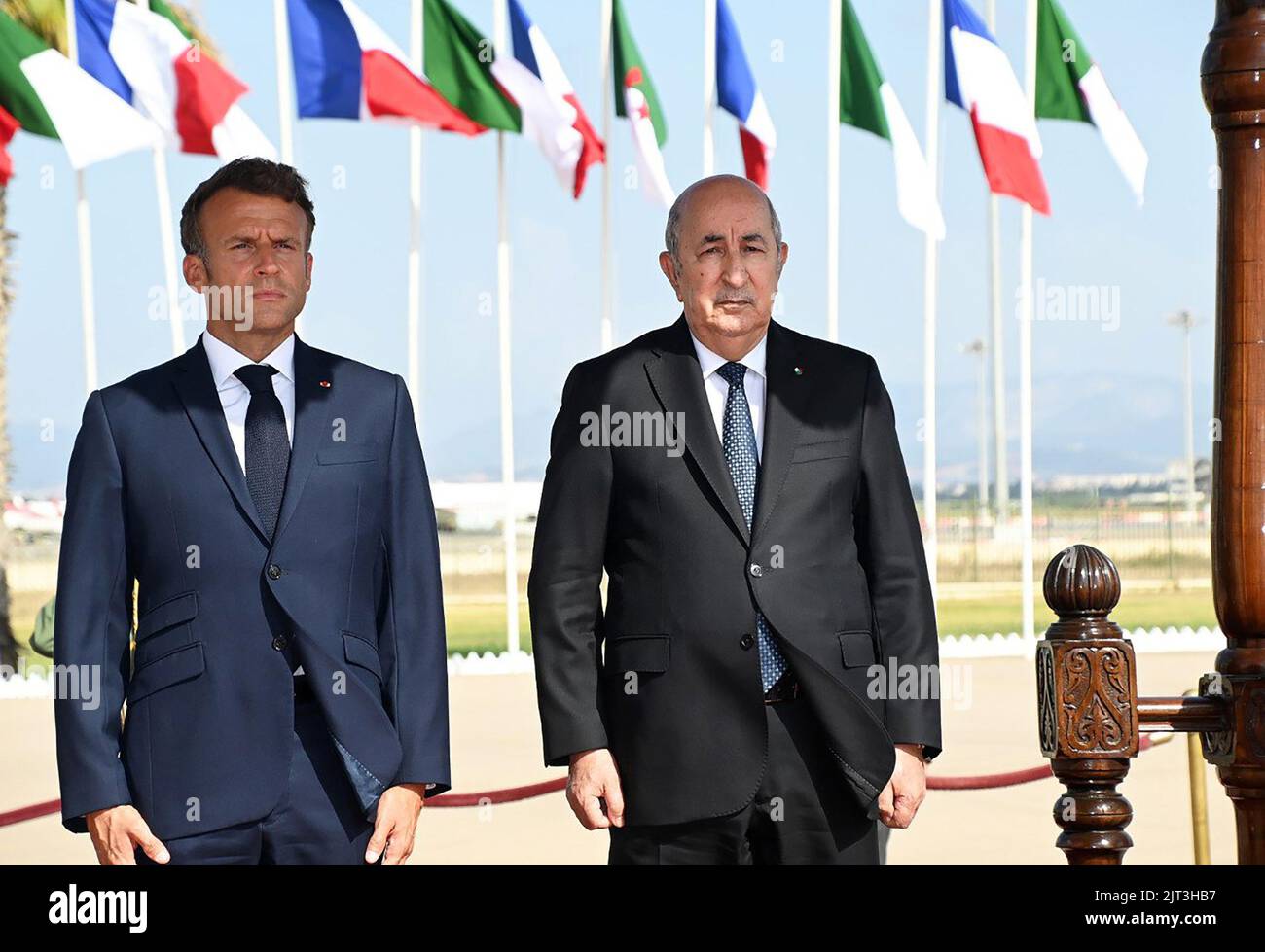 (220827) -- ALGIERS, Aug. 27, 2022 (Xinhua) -- Algerian President Abdelmadjid Tebboune (R) holds a seeing-off ceremony for French President Emmanuel Macron in Algiers, Algeria, on Aug. 27, 2022. Algeria and France on Saturday signed a joint declaration for a 'renewed partnership' at the end of the three-day visit of French President Emmanuel Macron. (Algerian Presidency/Handout via Xinhua) Stock Photo