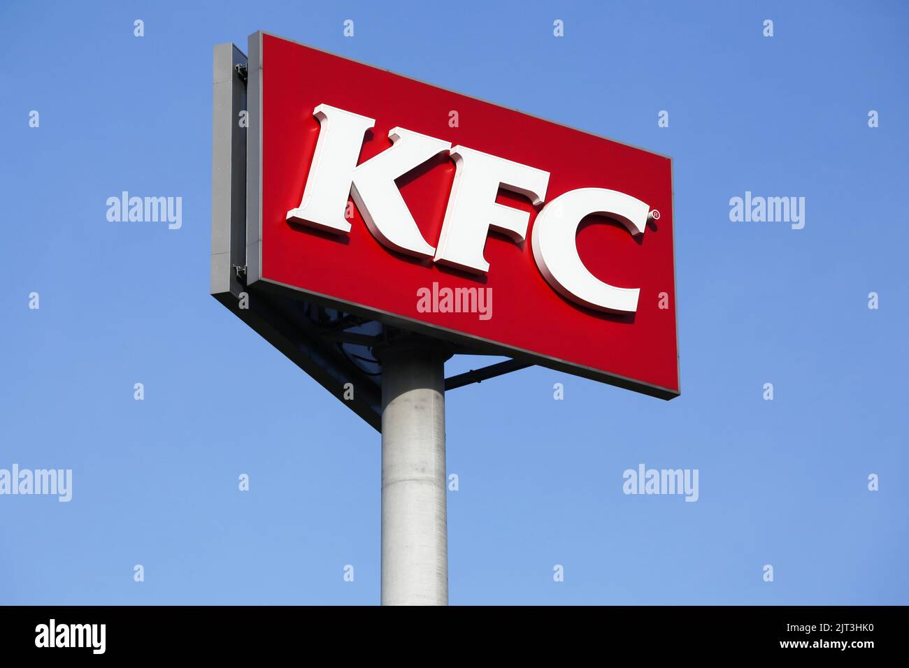 Gyhum, Germany - July 22, 2018: KFC logo on a pole. KFC is a fast food restaurant chain that specializes in fried chicken Stock Photo