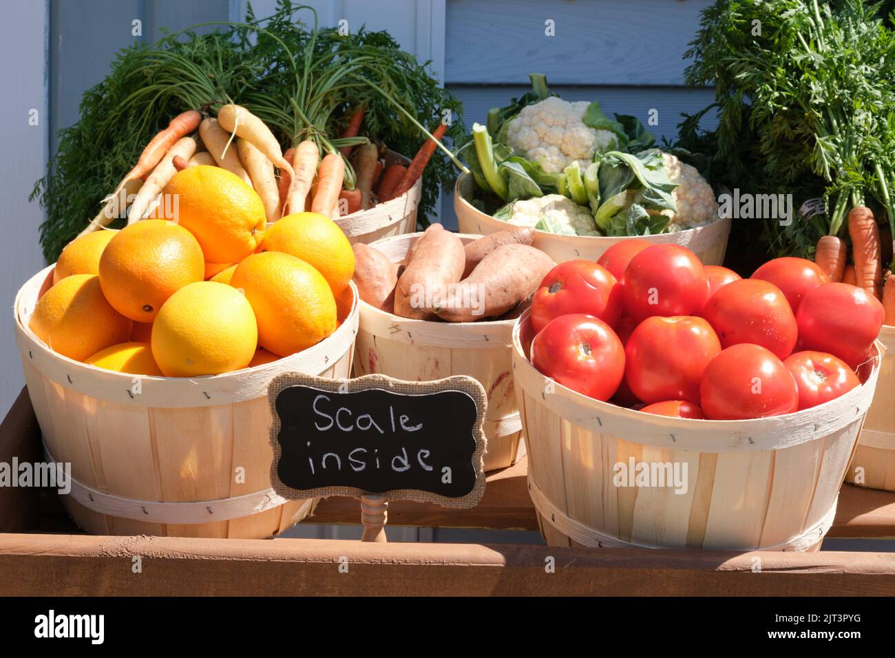Vegetable and fruit market outdoors display in baskets outside Stock Photo