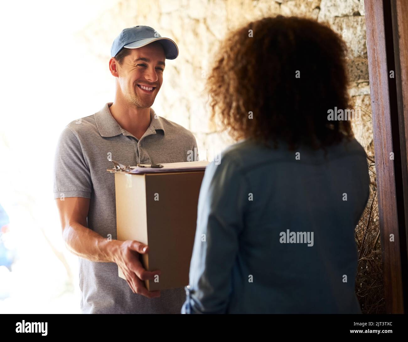 Delivery men home hi-res stock photography and images - Alamy