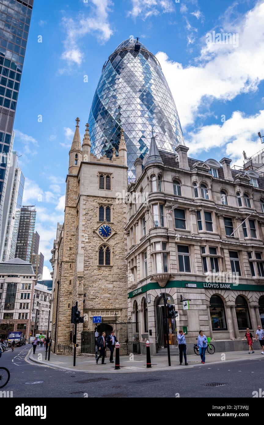 London, UK - August 25, 2022: Skyscraper at 30 St Mary Axe, also known as the Gherkin, and is an Iconic building in the City of London business distri Stock Photo