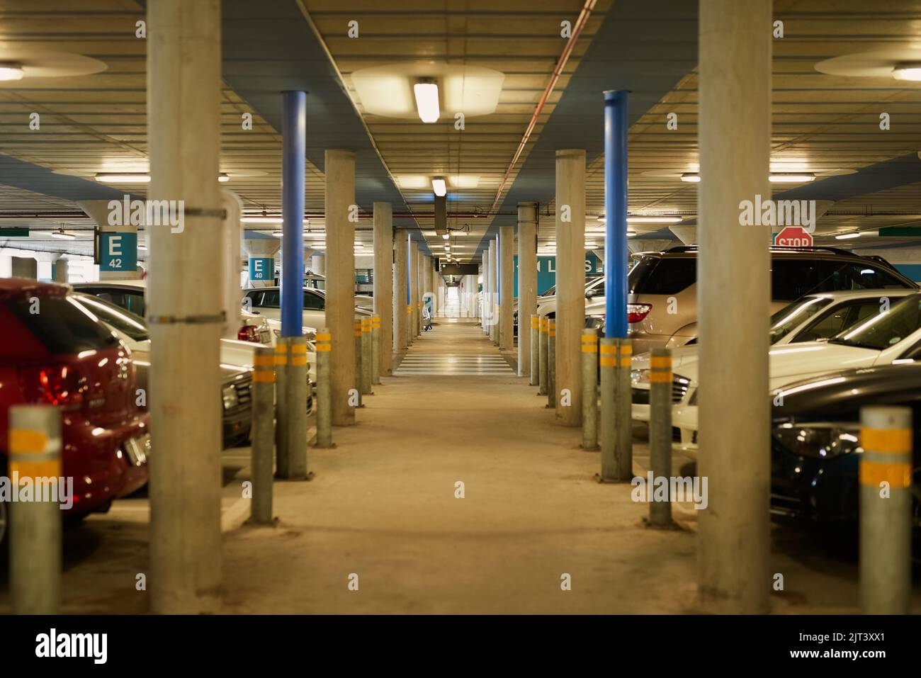Your car is safe and sound. an underground parking garage full of cars