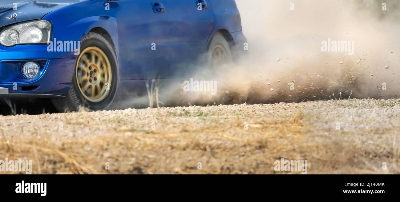 Rally racing car on dirt track Stock Photo - Alamy