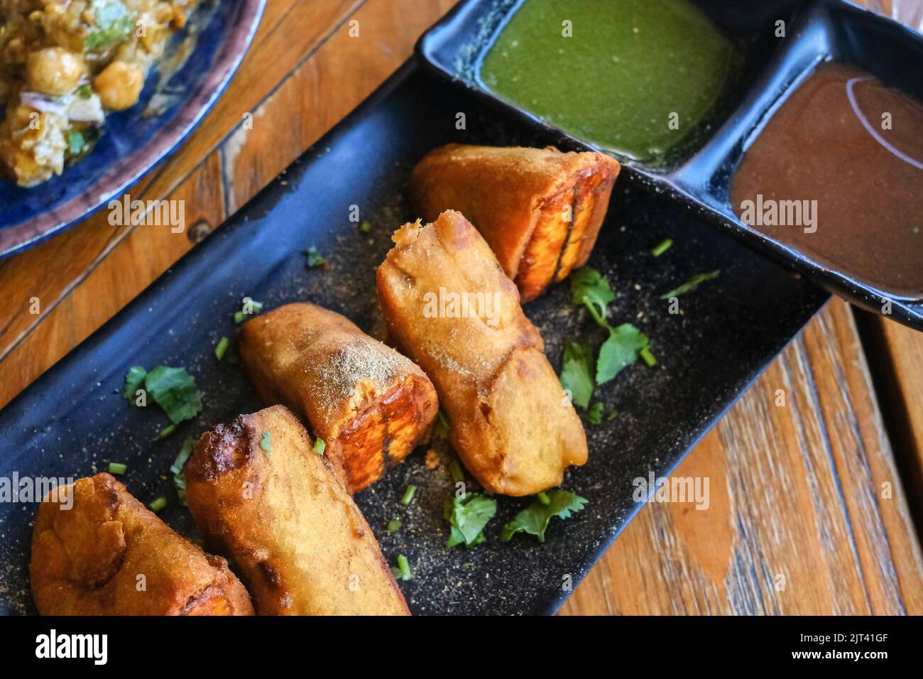 Paneer pakora deepfried pastries filled with Indian cottage cheese at