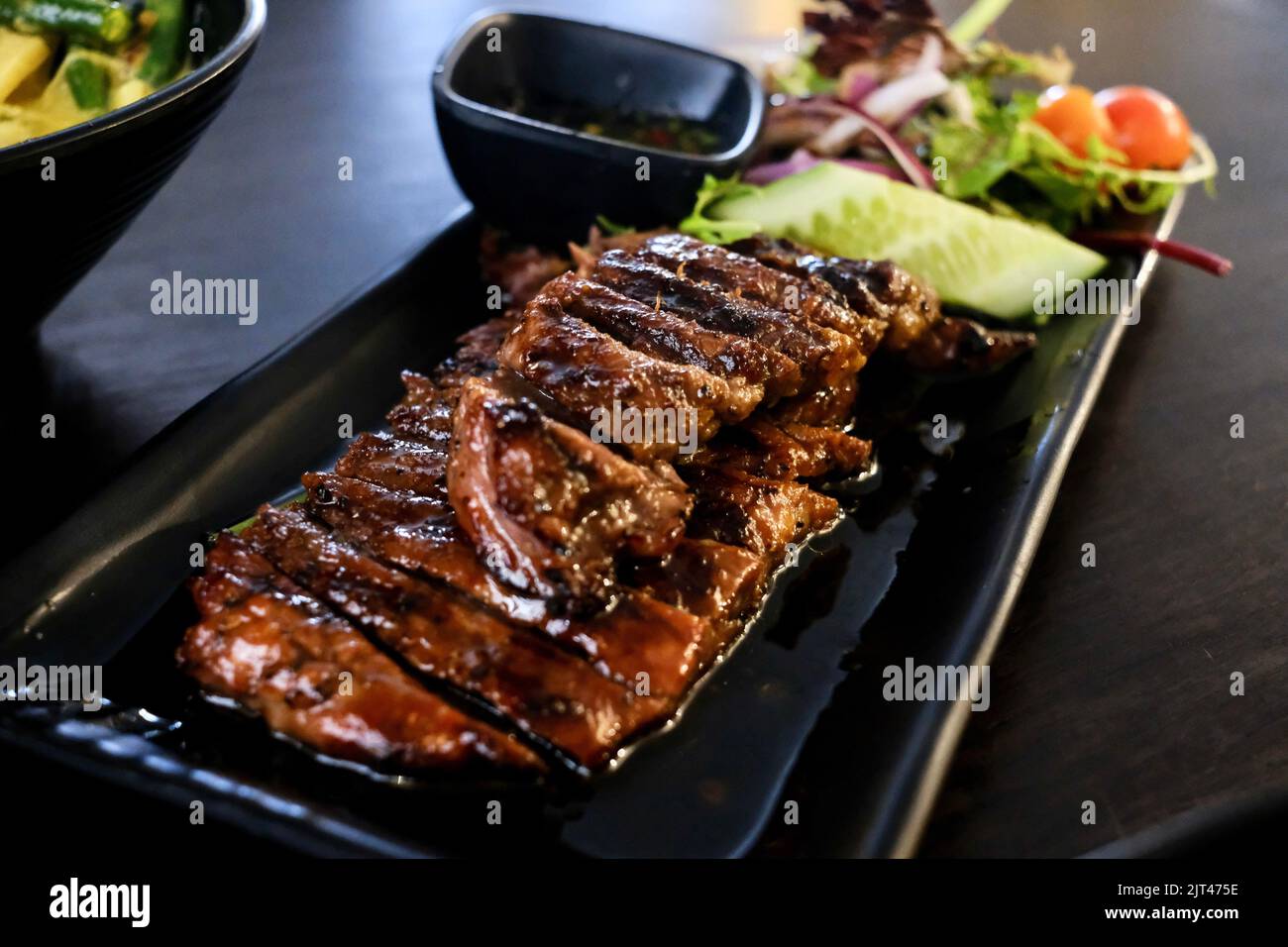 Grilled tiger beef with salad at Holy Basil, a Thai and Lao restaurant in Canley Vale — Sydney, Australia Stock Photo