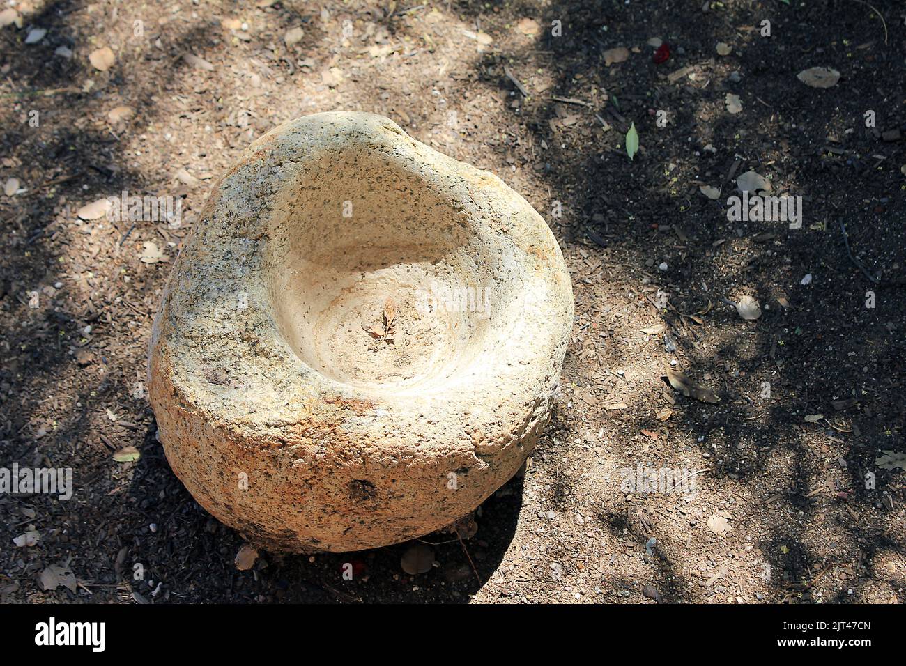 Native American Grind stone for grinding grain Stock Photo