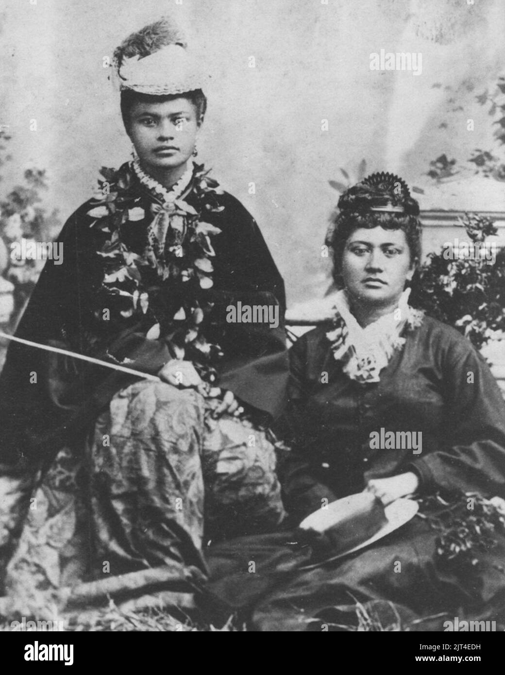 Two native Hawaiian pāʻū riders, photograph by A. A. Montano. 1880