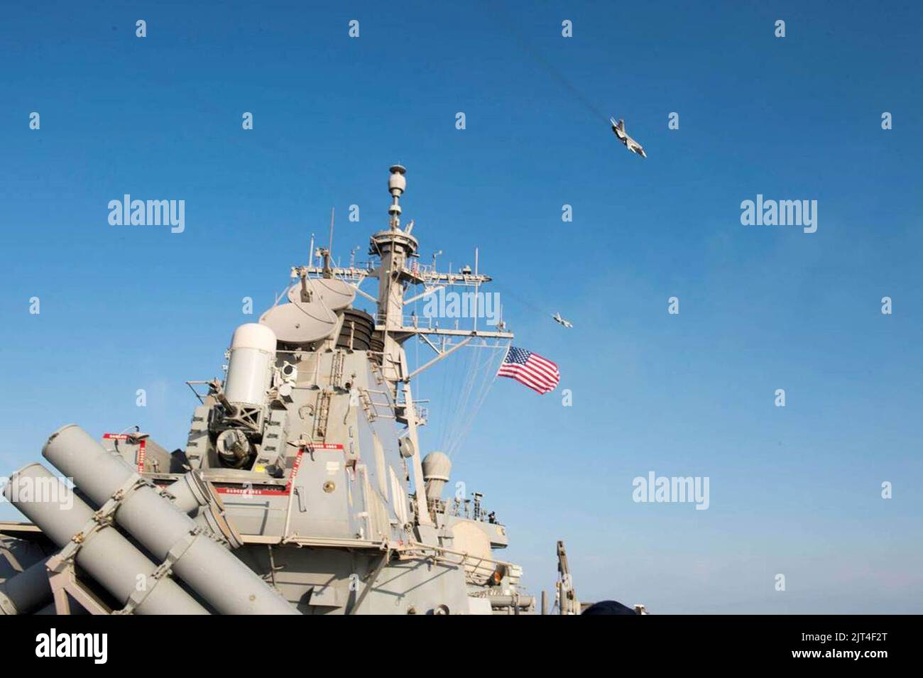 Two Russian Sukhoi Su-24 fly over the USS Donald Cook (DDG-75) - 160412 Stock Photo