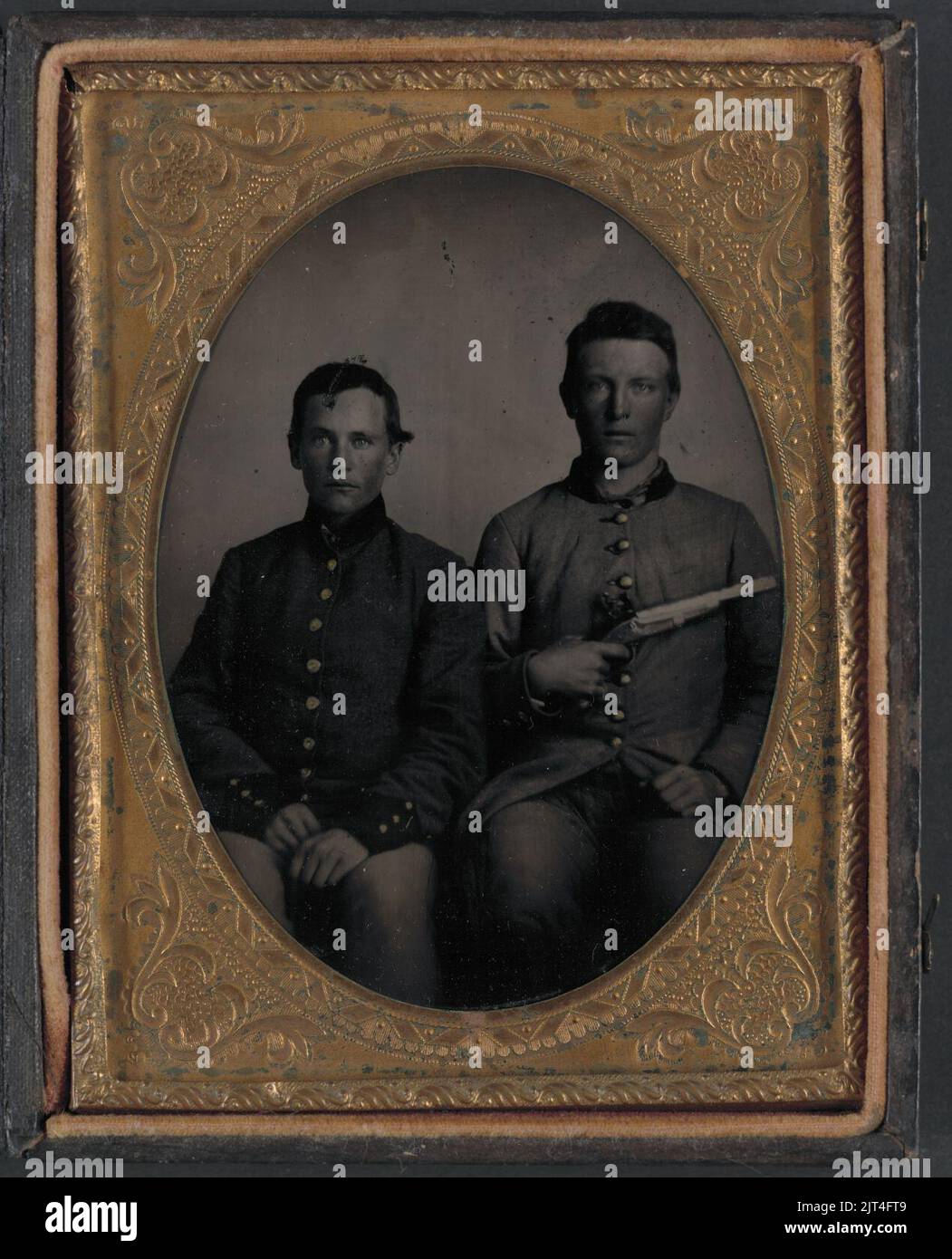 Two unidentified soldiers in Confederate uniforms, one with flintlock ...