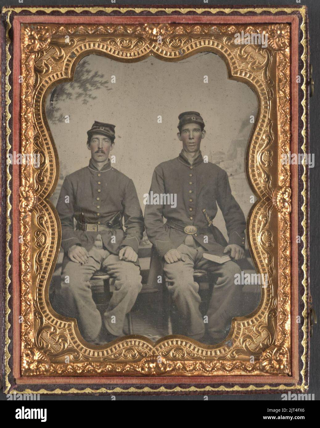 Two unidentified soldiers in Union uniforms with sword and book in ...