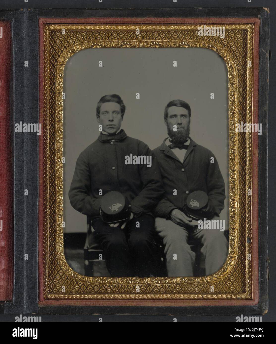 Two unidentified soldiers, possibly father and son, in Union uniforms ...