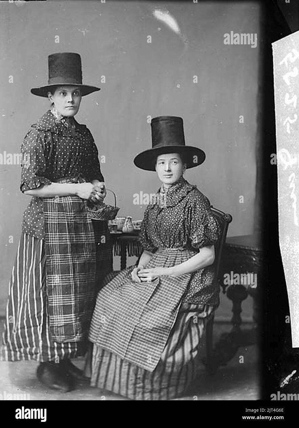 Two women in national dress (Davies Stock Photo Alamy