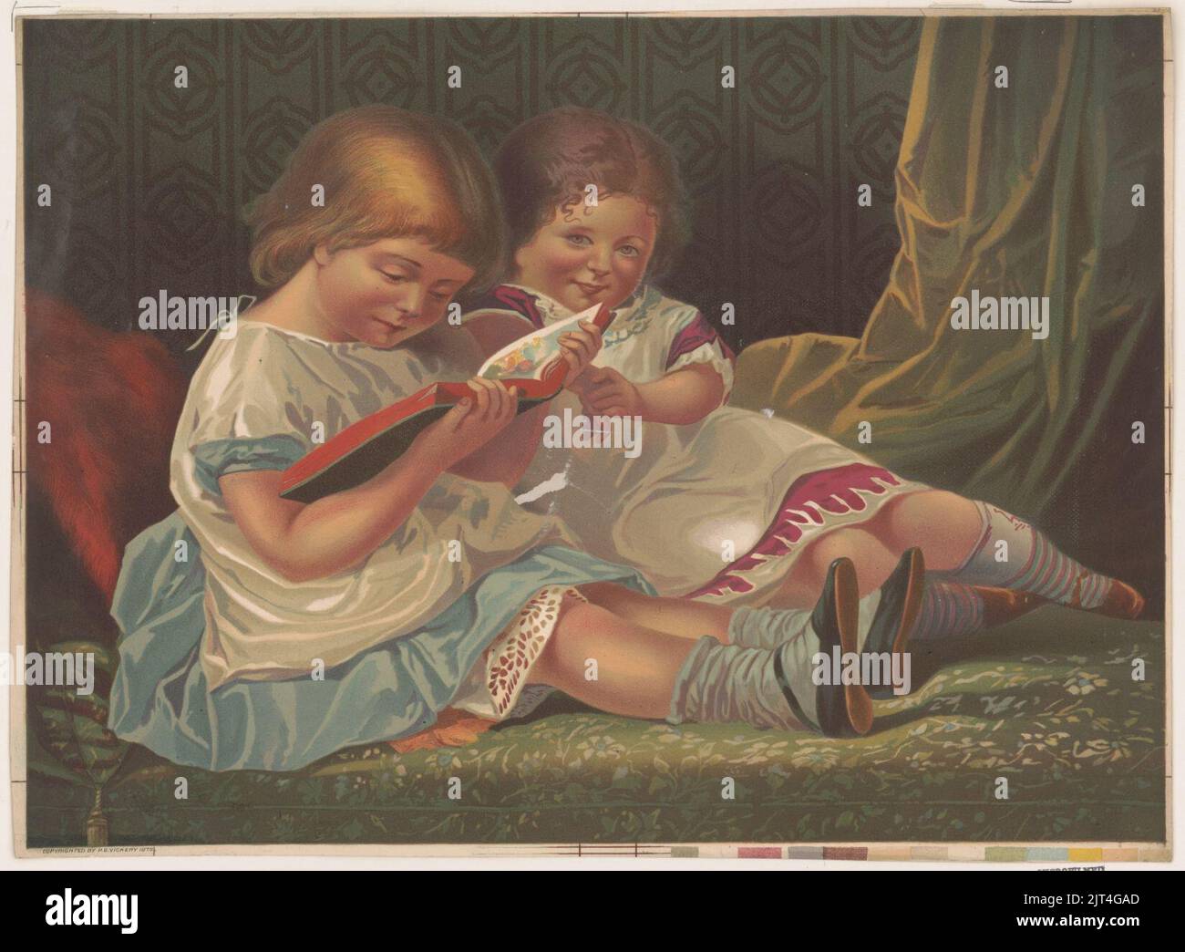 Two young girls reading book Stock Photo Alamy