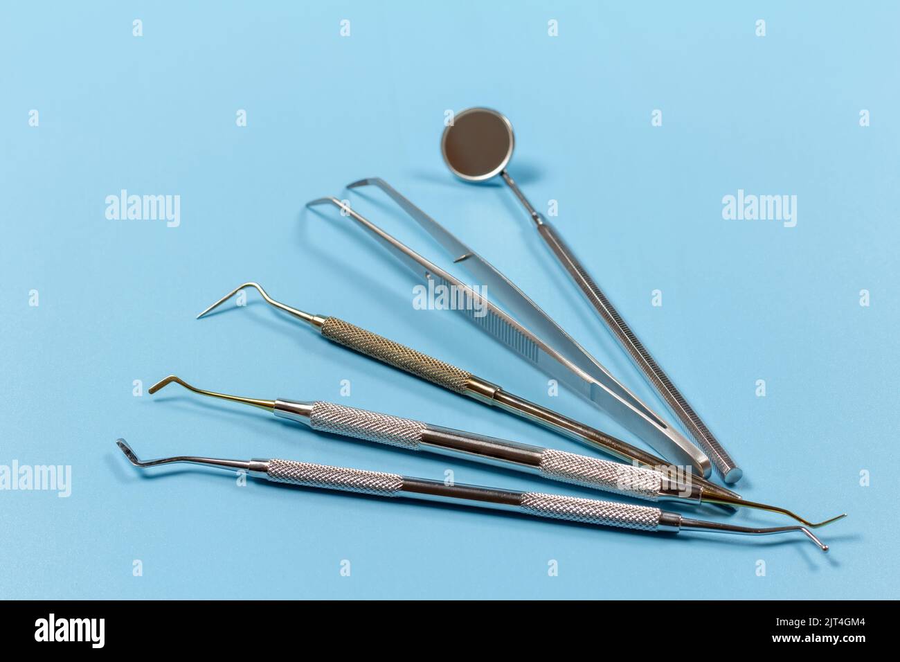 Mouth mirror, the tweezers, the dental restoration instrument, the