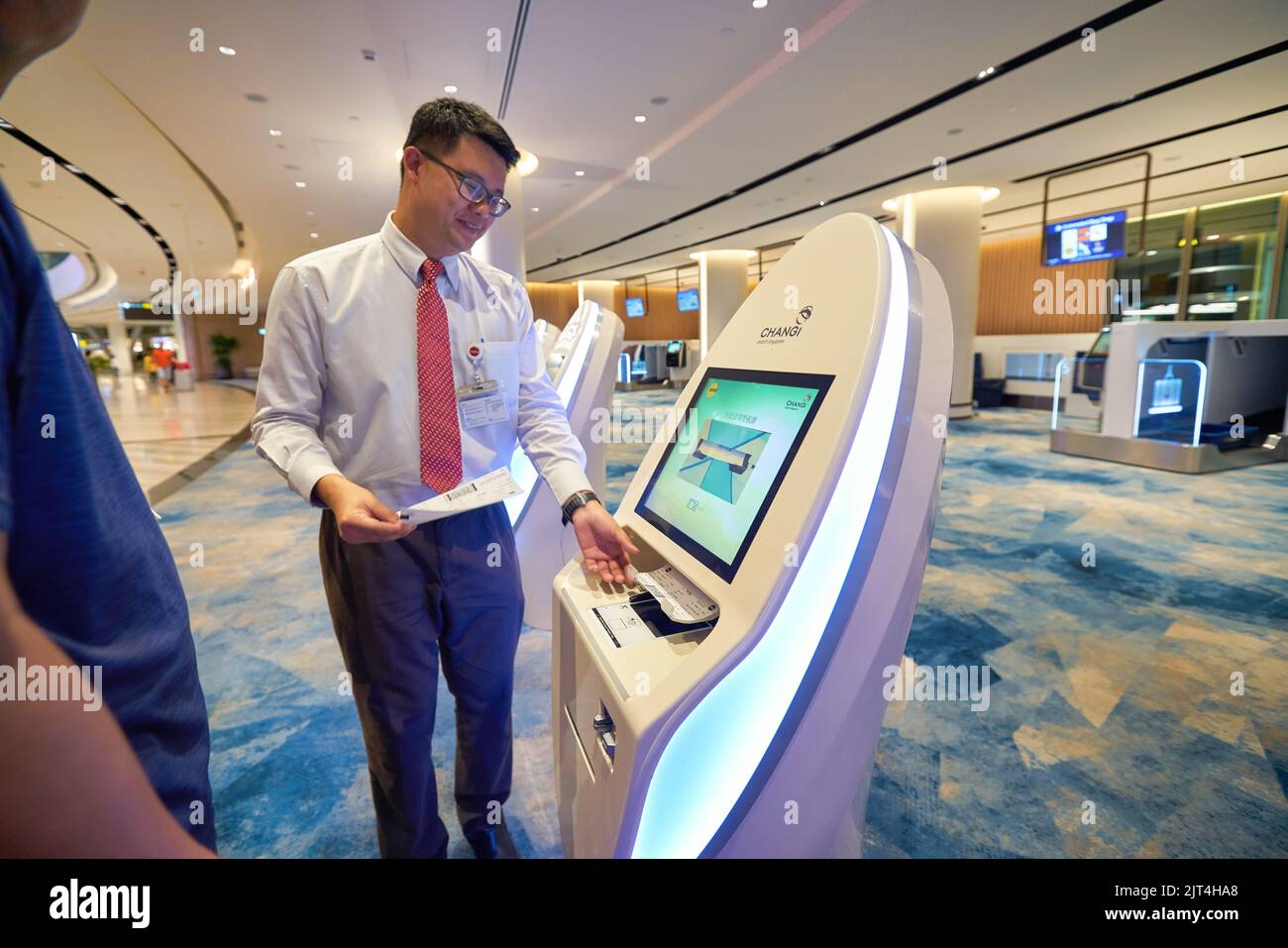 SINGAPORE CIRCA JANUARY 2020 Staff Help Traveller At The Early singapore-circa-january-2020-staff-help-traveller-at-the-early