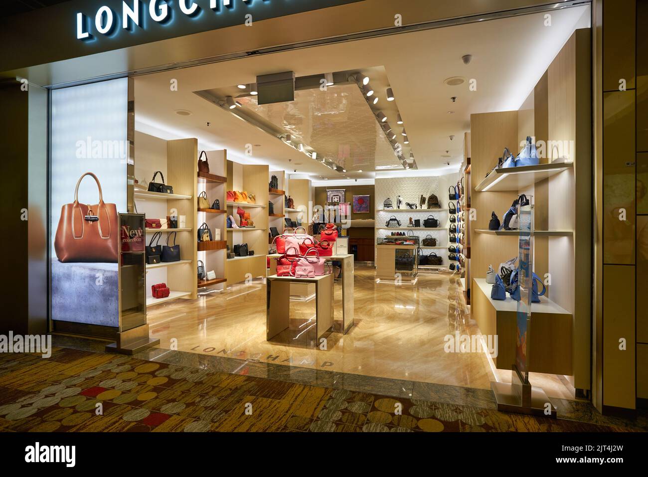 SINGAPORE - CIRCA JANUARY, 2020: bags on display at Longchamp store in ...
