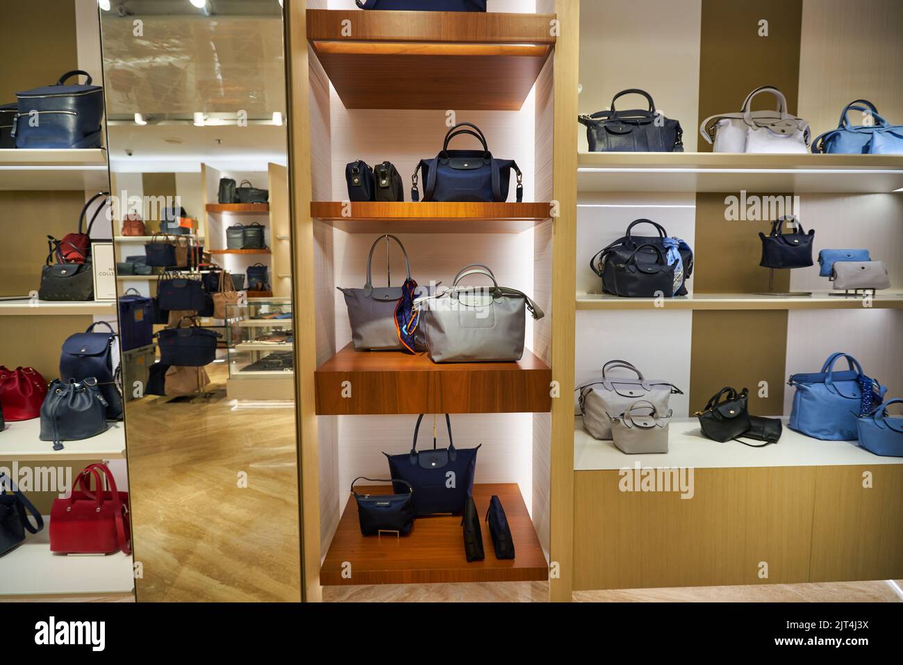 SINGAPORE - CIRCA JANUARY, 2020: bags on display at Longchamp store in ...
