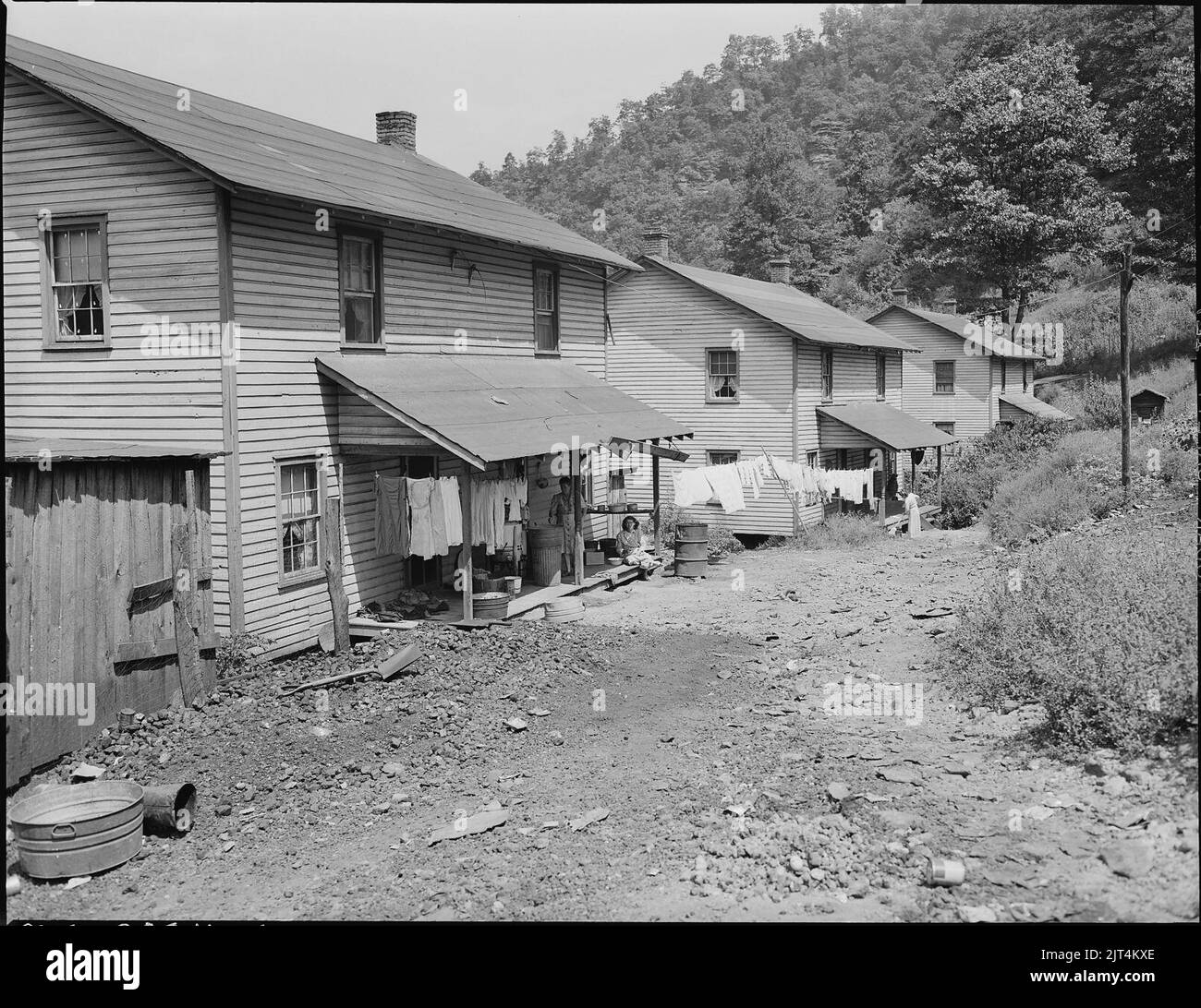 Typical eight room, two family houses. Each half of the house rents for ...