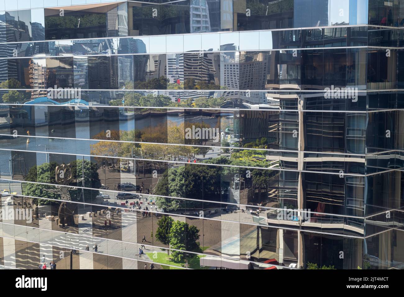 Melbourne's CBD and Yarra River are reflected in a modern high rise building. Stock Photo