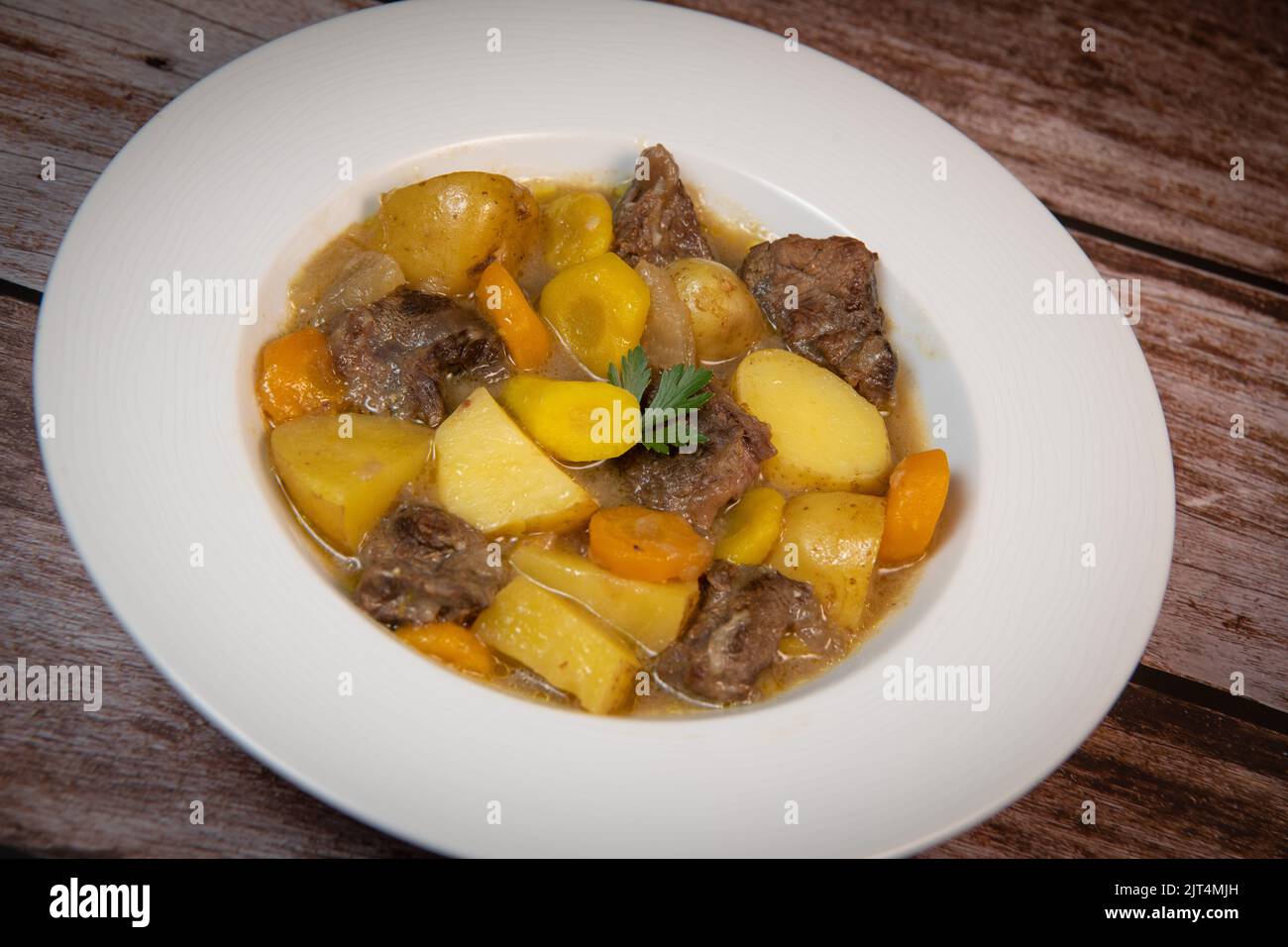 Recipe for beer and mustard beef chuck stew with potatoes, turnips and