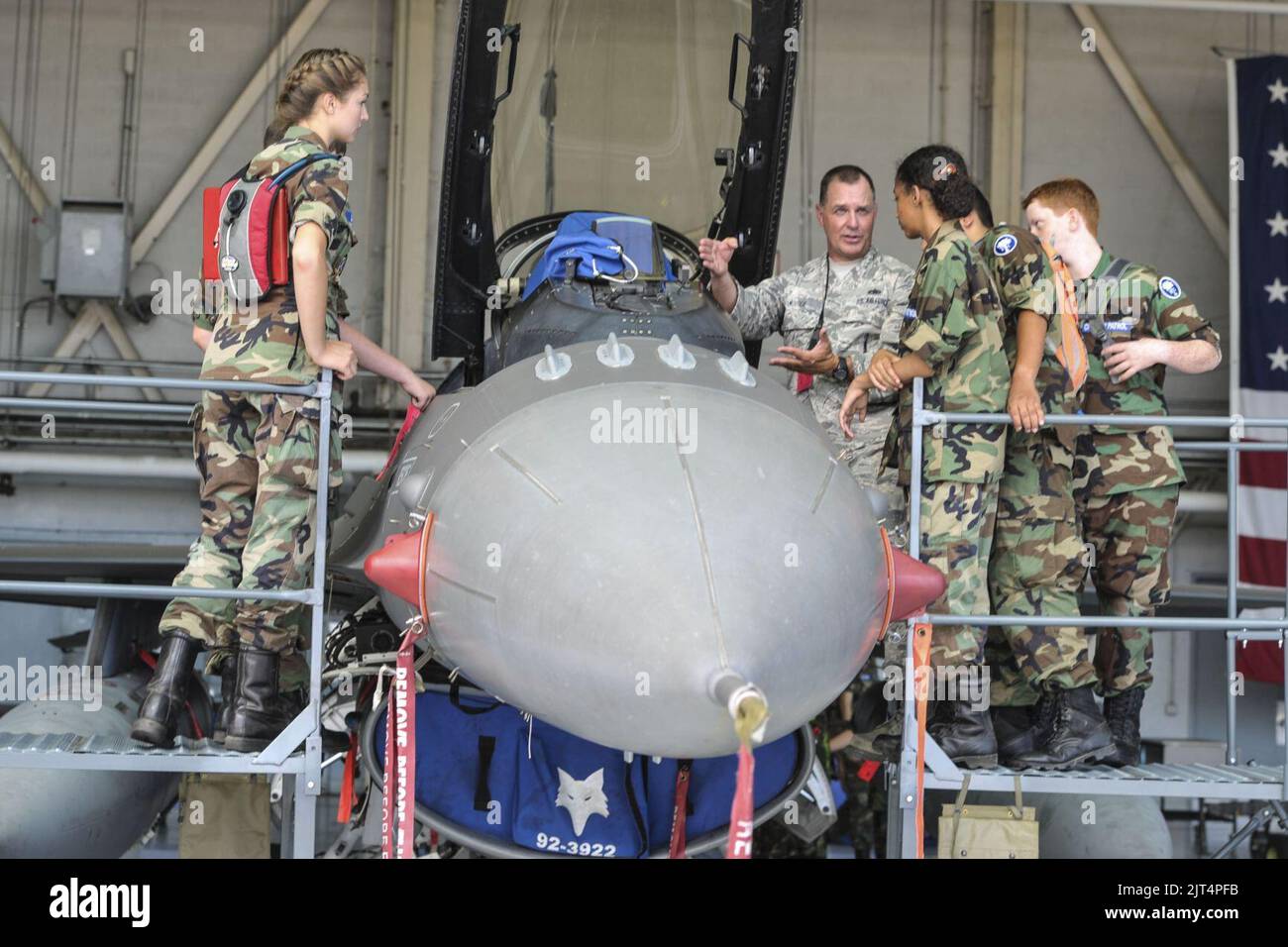 U.S. Air Force Tech. Sgt. gives an F-16 block 52 tour to Civil Air Patrol cadets from South and North Carolina. Stock Photo