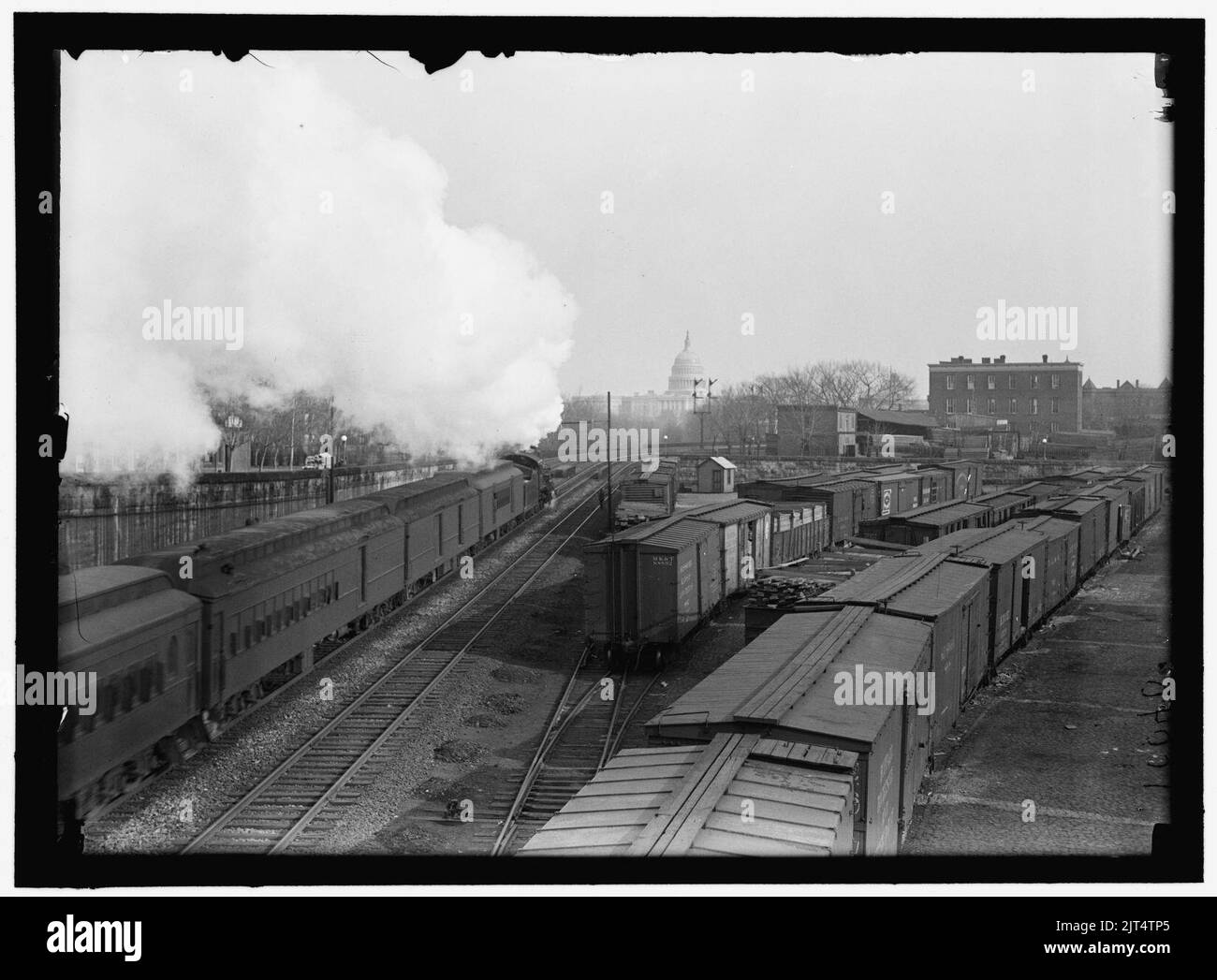 U S CAPITOL DOME FROM RAILROAD YARDS IN SOUTHEAST SECTION Stock Photo u-s-capitol-dome-from-railroad-yards-in-southeast-section-stock-photo