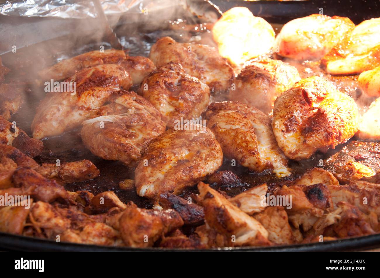 Grilling chicken, Portobello Road Market, Portobello Road, London, UK