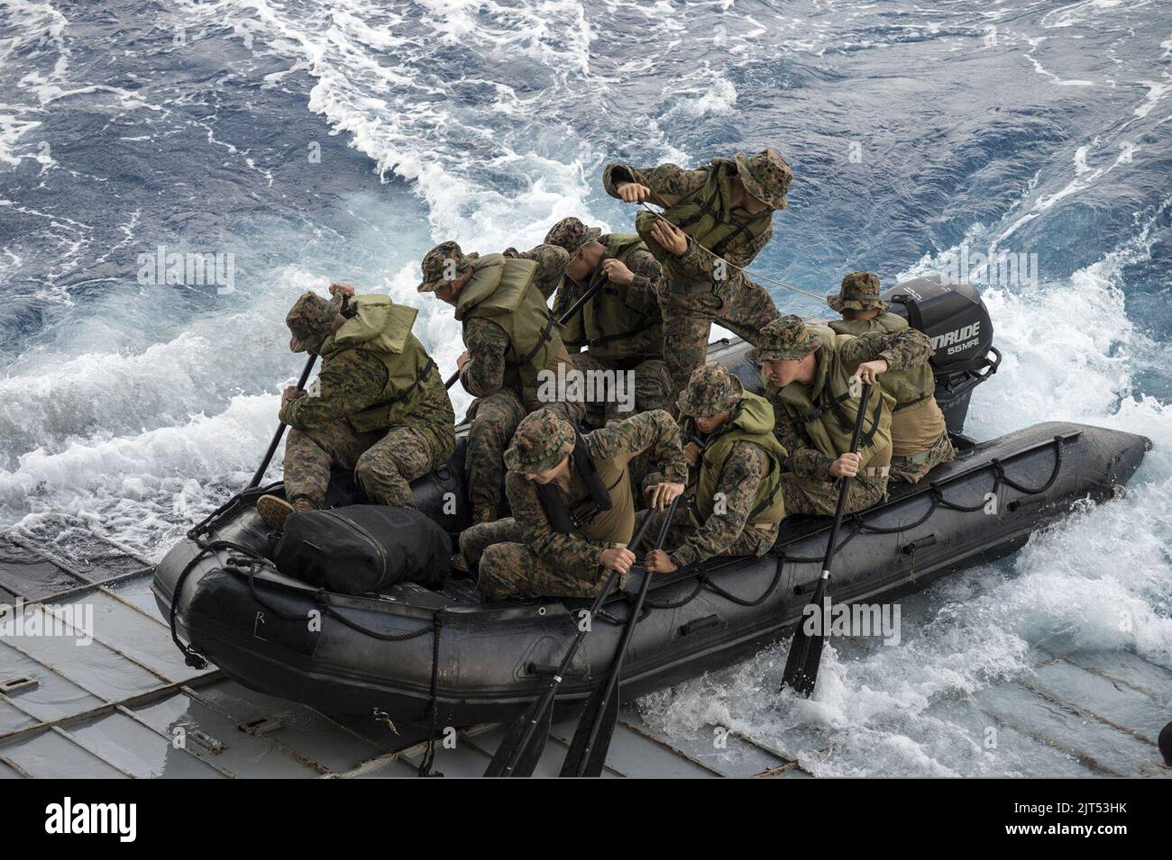 U.S. Marines assigned to Foxtrot Company, Battalion Landing Team, 2nd Battalion, 5th Marine Regiment, 31st Marine Expeditionary Unit conduct launch and recovery operations with a combat rubber raiding craft from 140301 Stock Photo