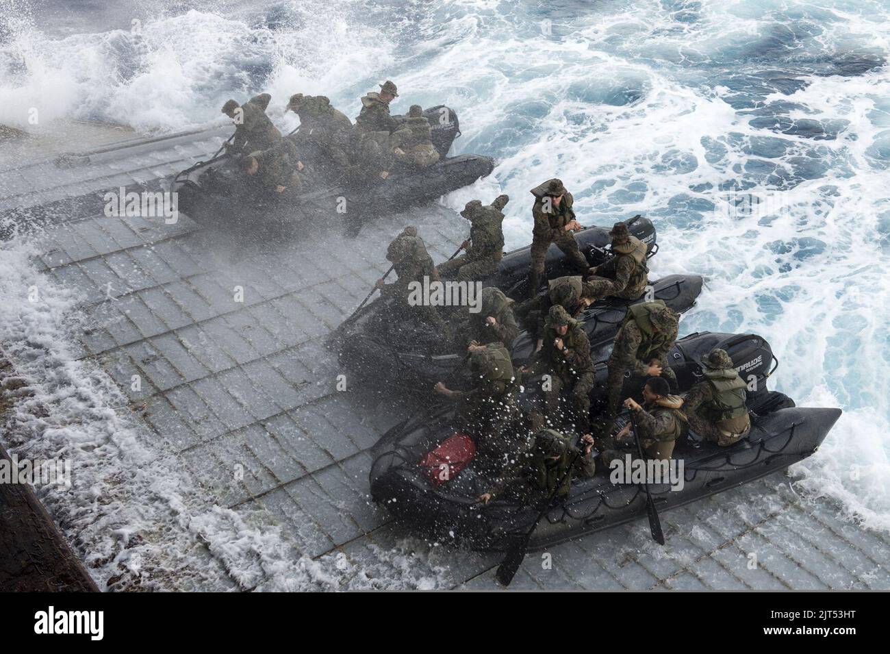 U.S. Marines assigned to Foxtrot Company, Battalion Landing Team, 2nd Battalion, 5th Marine Regiment, 31st Marine Expeditionary Unit conduct launch and recovery operations with combat rubber raiding craft from 140301 Stock Photo