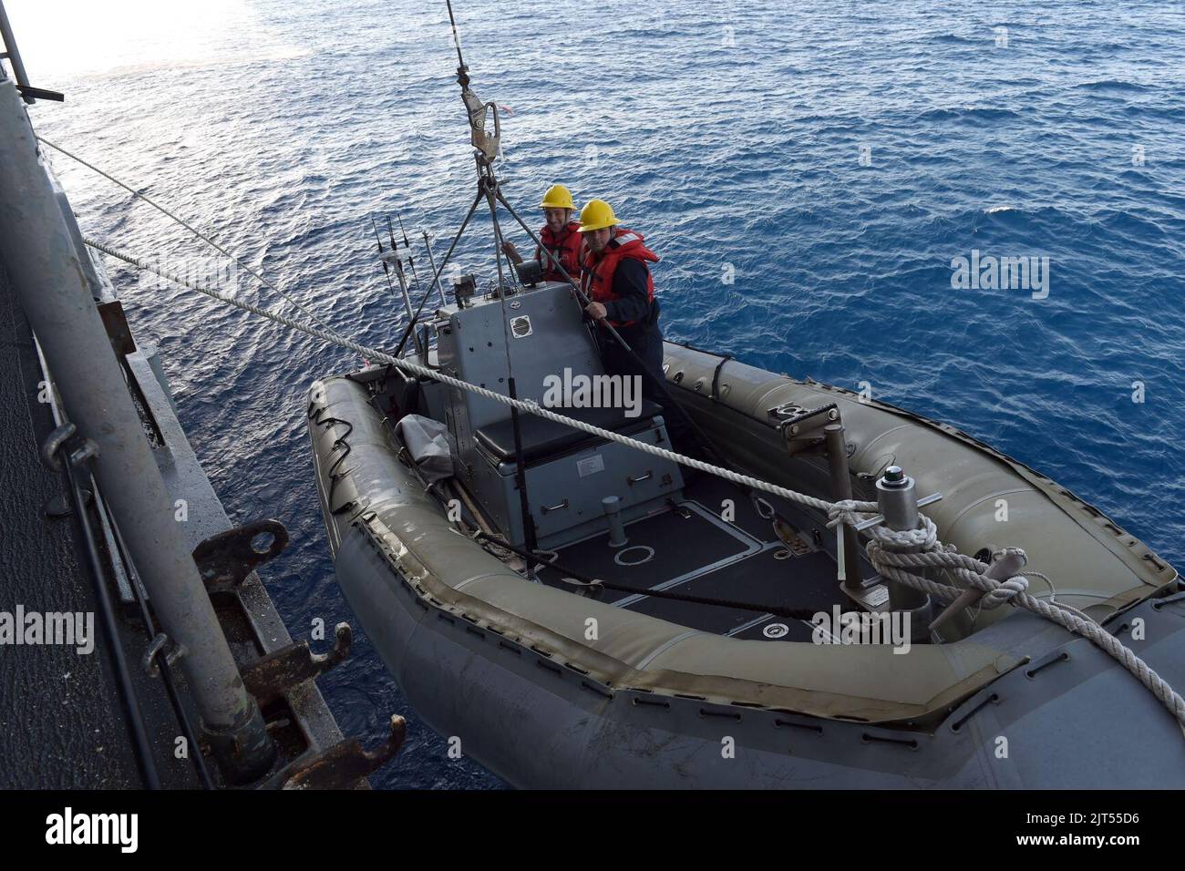 U.S. Navy Boatswain's Mate 2nd Class left, and Boatswain's Mate 1st