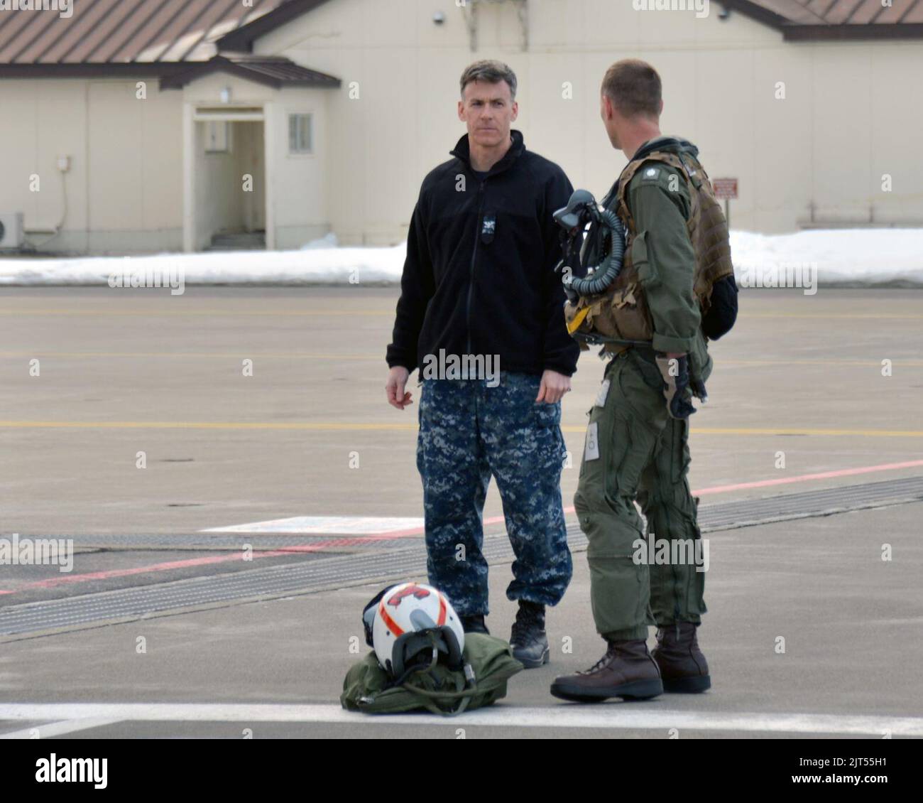Commanding Picture U.S. Navy Capt. left, the commanding officer of Naval Air Facility (NAF ...