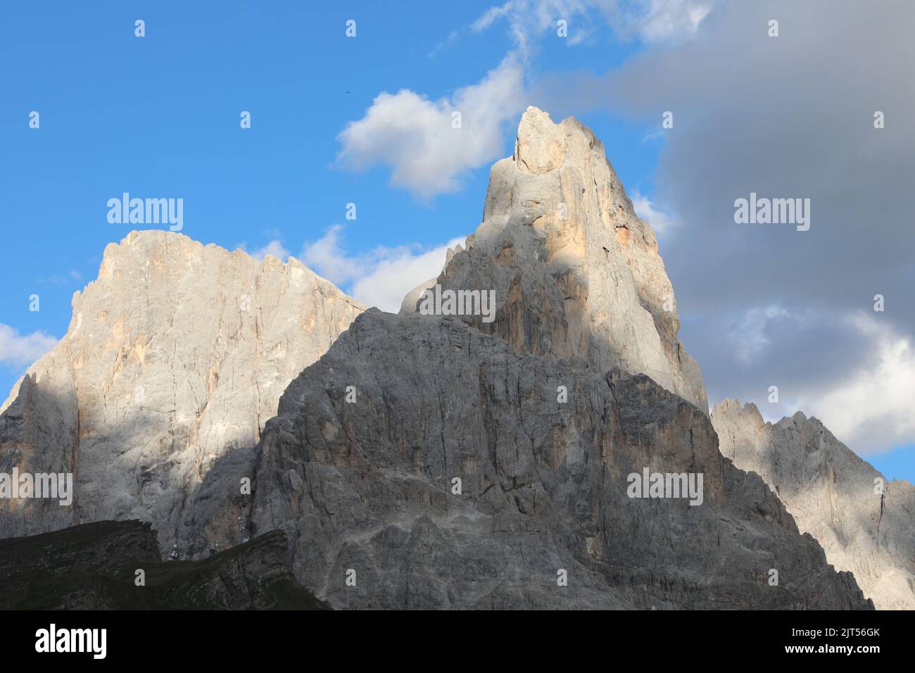 peak of the Dolomites in northern Italy called Cimon della Pala and on the left the peak called CIMA Vezzana Stock Photo