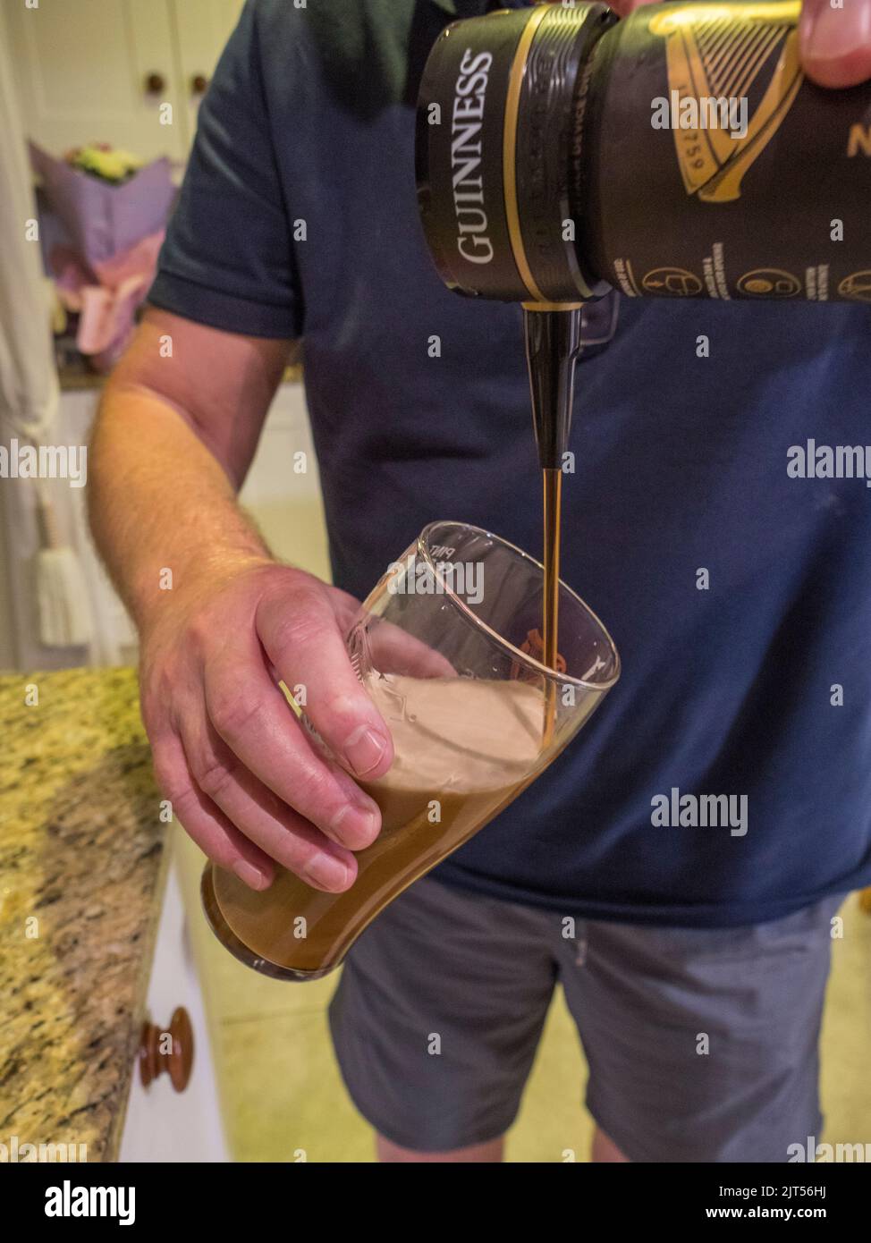 Pouring guinness can hires stock photography and images Alamy
