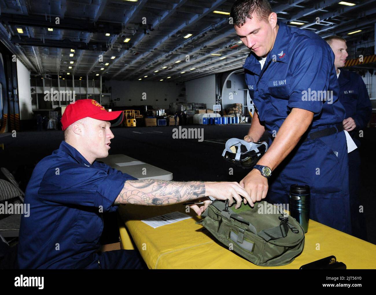 U.S. Navy Damage Controlman 3rd Class Left, Assigned To Damage Control ...