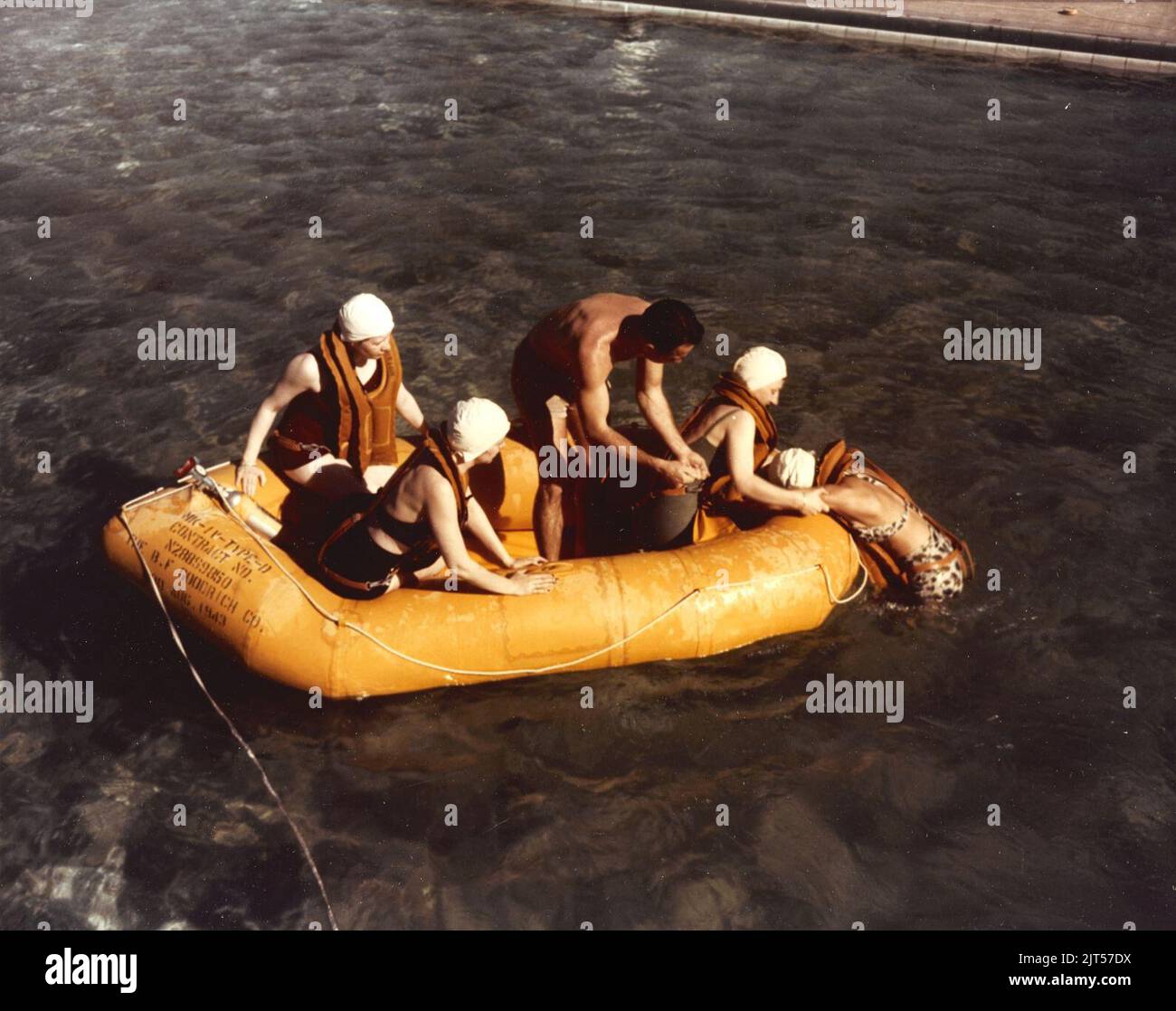 Us Navy Raft U.S. Navy Flight Nurses practice how to get an unconscious person into ...
