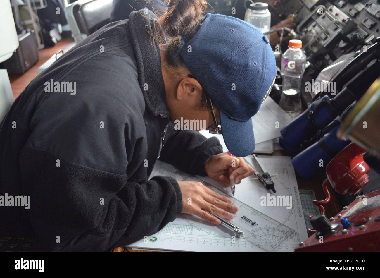 U.S. Navy Lt. j.g. a training officer aboard the guided missile frigate ...
