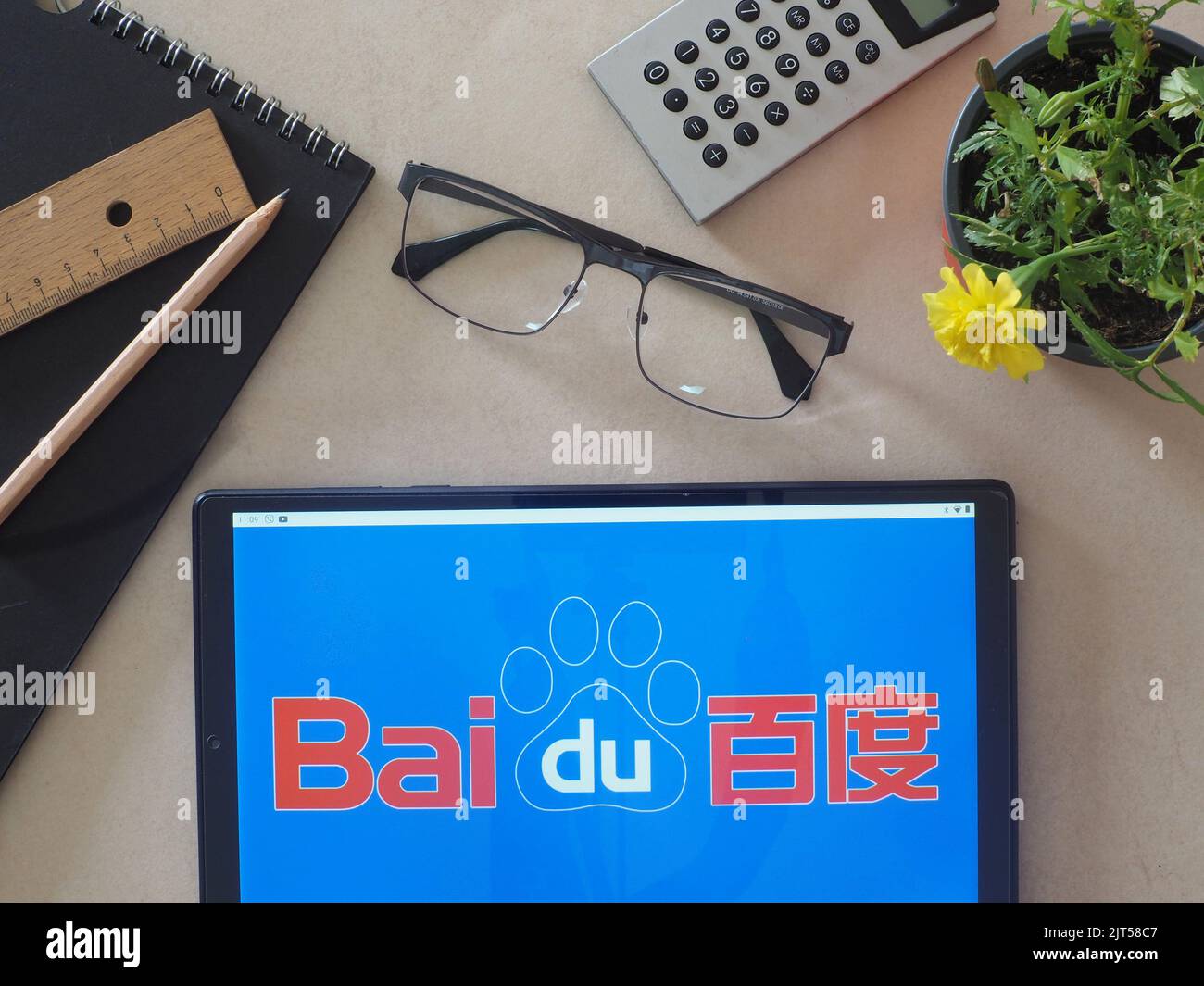 In this photo illustration,  Baidu, Inc. logo seen displayed on a tablet Stock Photo