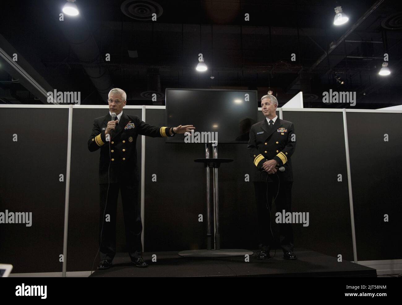 U.S. Navy Rear Adm. Matthew Klunder, left, the chief of naval research, and Rear Adm. Thomas Eccles, the chief engineer and deputy commander for naval systems engineering, Naval Sea Systems Command, answer 130408 Stock Photo
