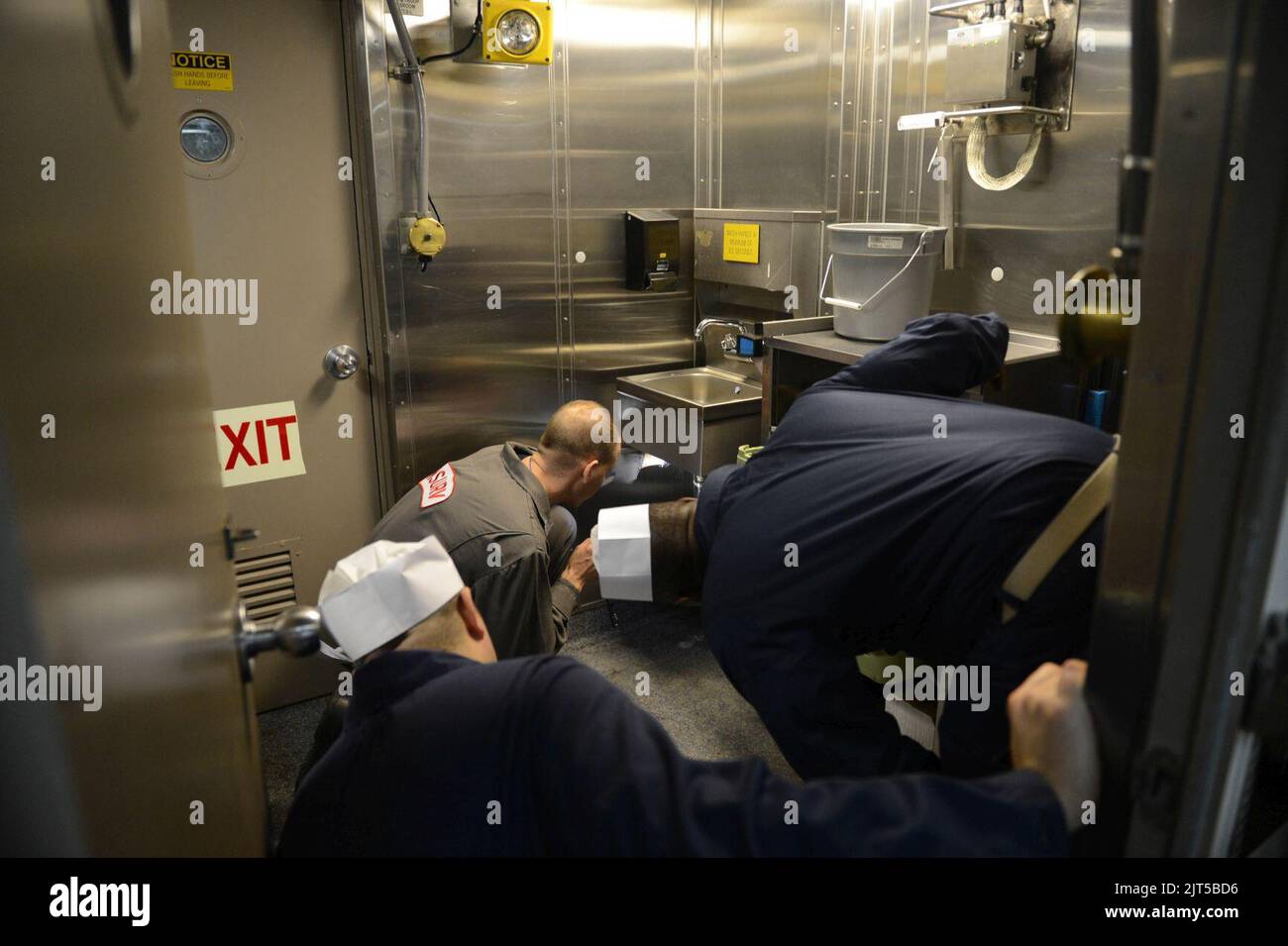 Insurv U.S. Sailors accompany a member of the Board of Inspection and Survey ...