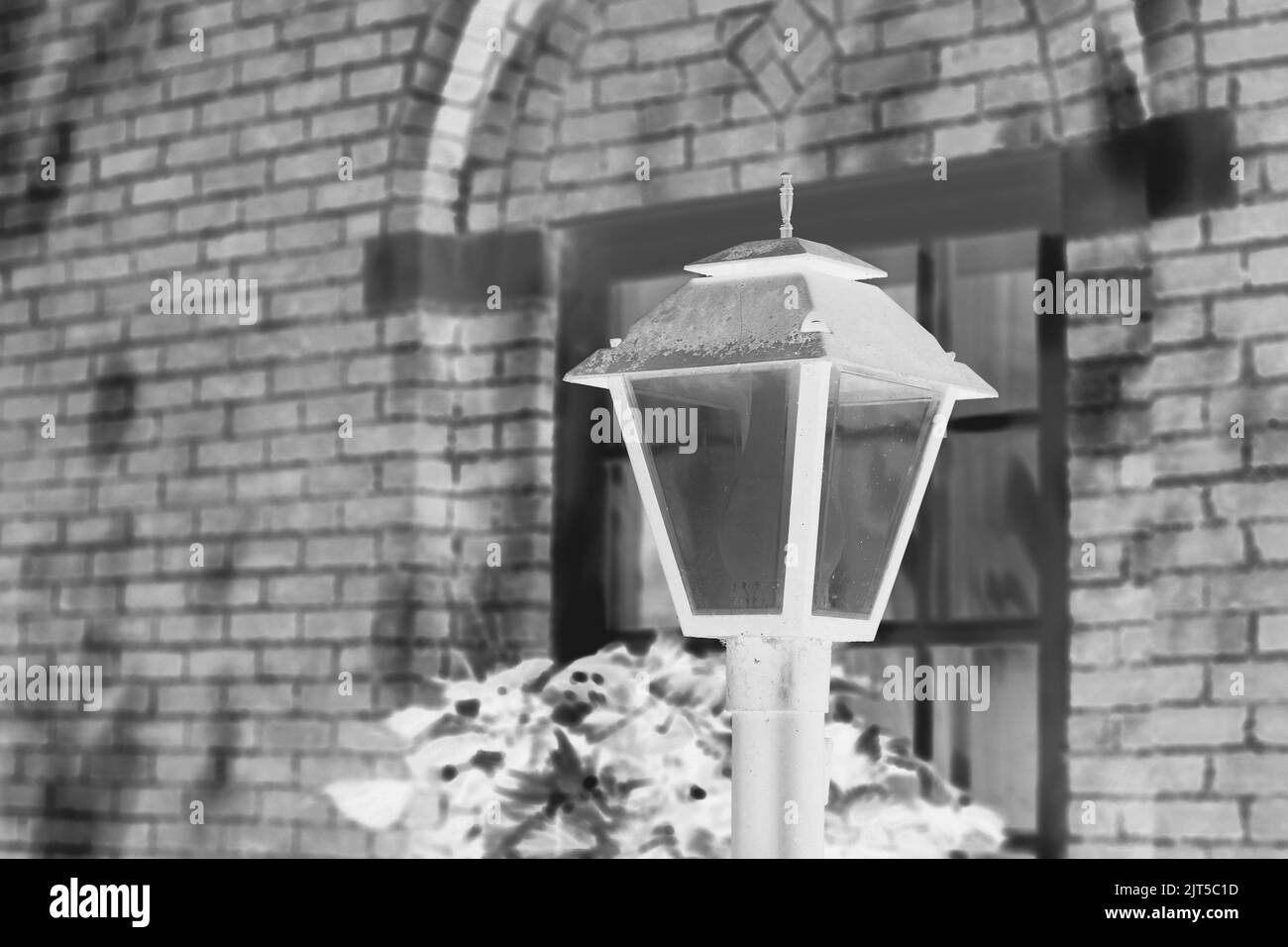 Simple typical common cast iron gas light in a black and white