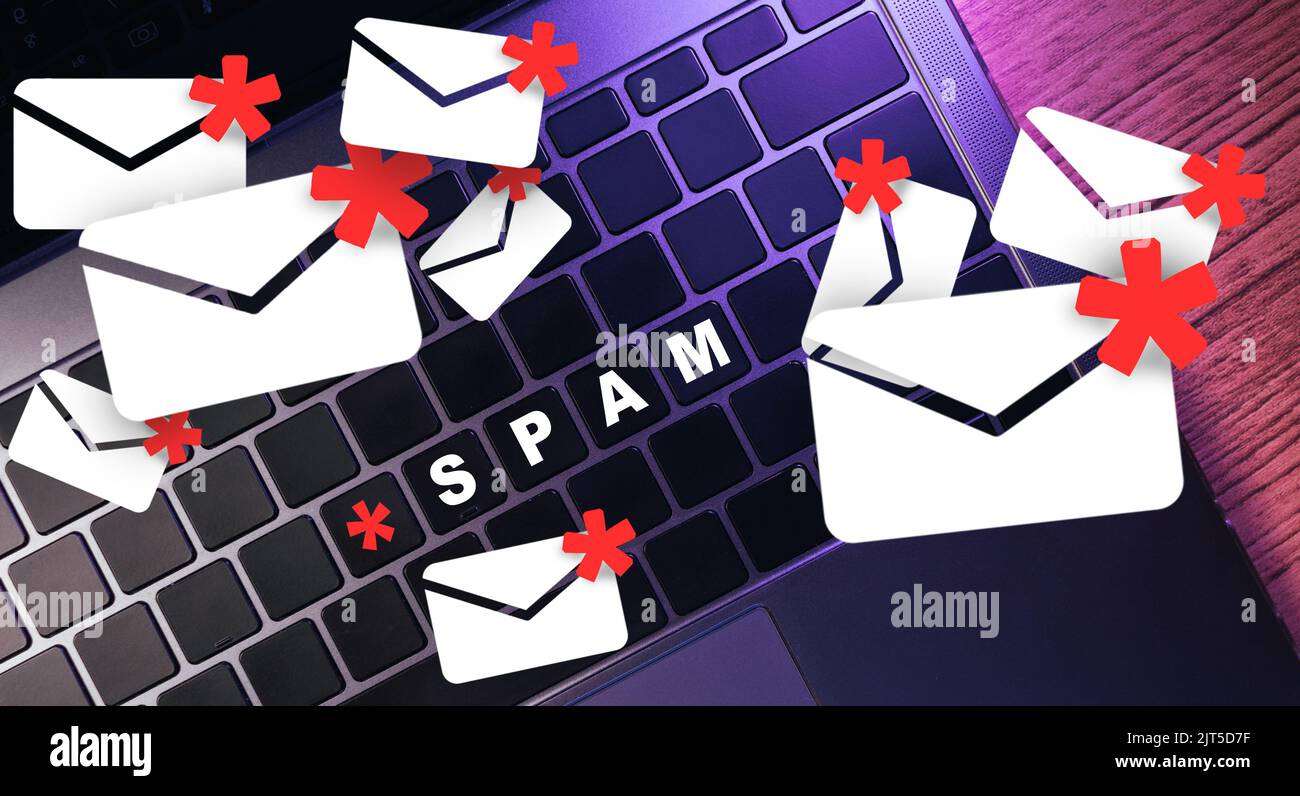 Laptop keyboard concept of spam mail protect. Phishing, scam and hack. Network security. Stock Photo