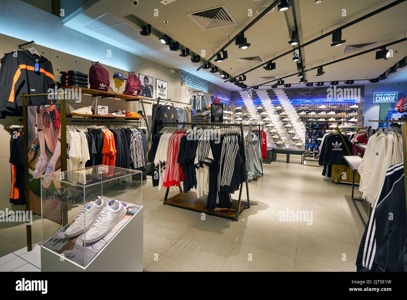 People shop adidas outlet in hi-res stock photography and images - Alamy