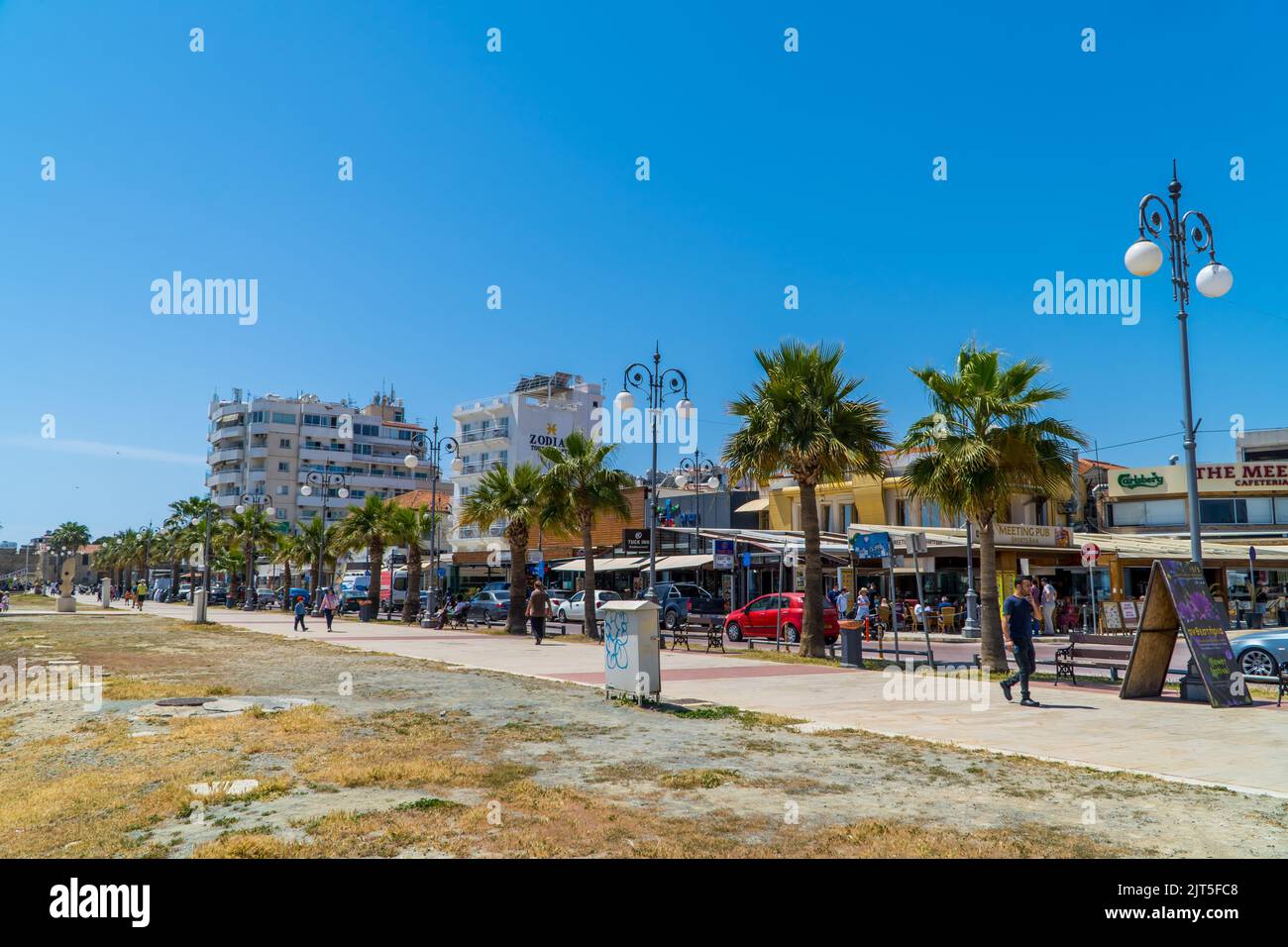 Larnaca, Cyprus April 22, 2022 Finikoudes Beach promenade in summer under blue sky Stock