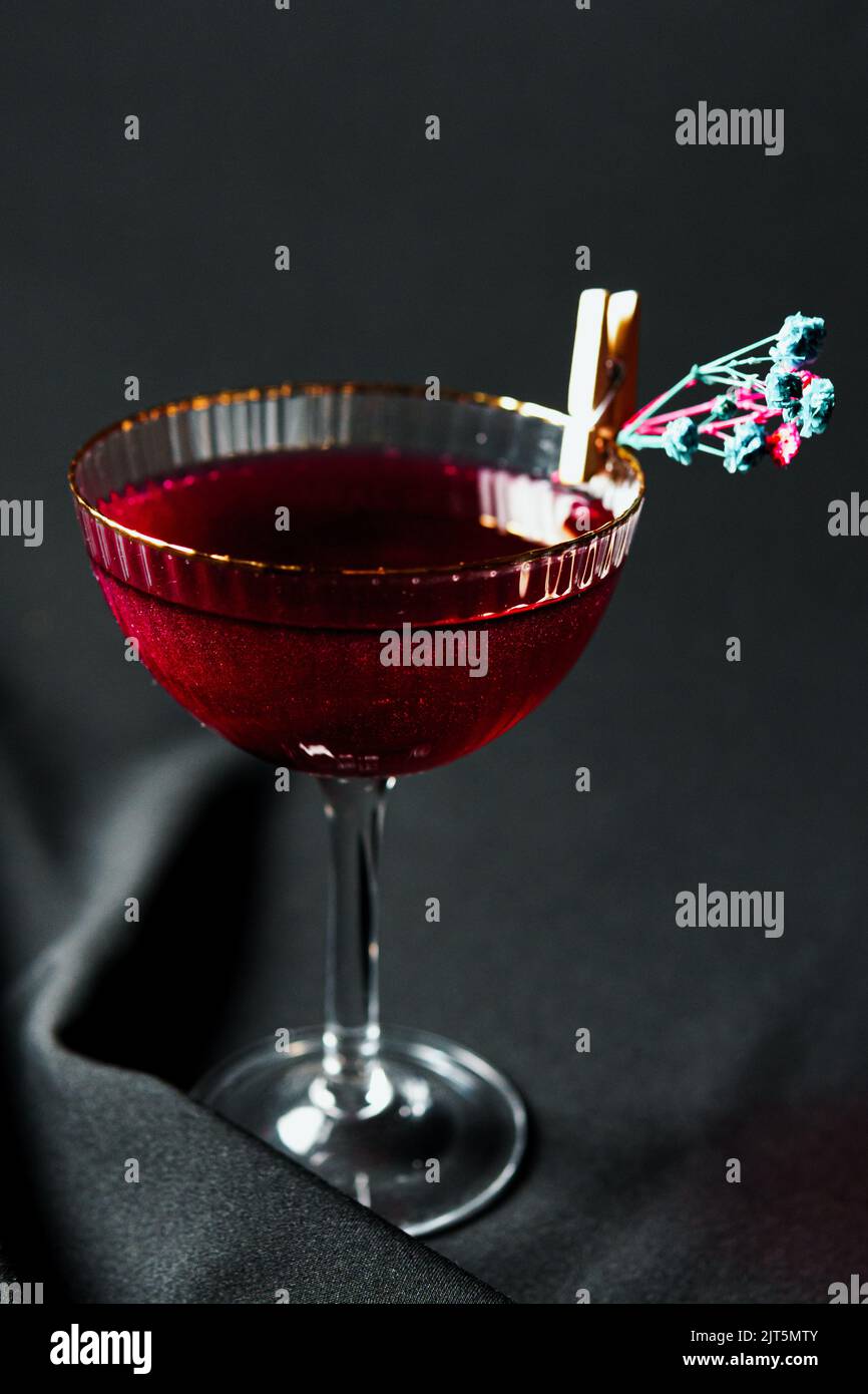 Alcoholic drink. A cocktail with elite alcohol on dark black background
