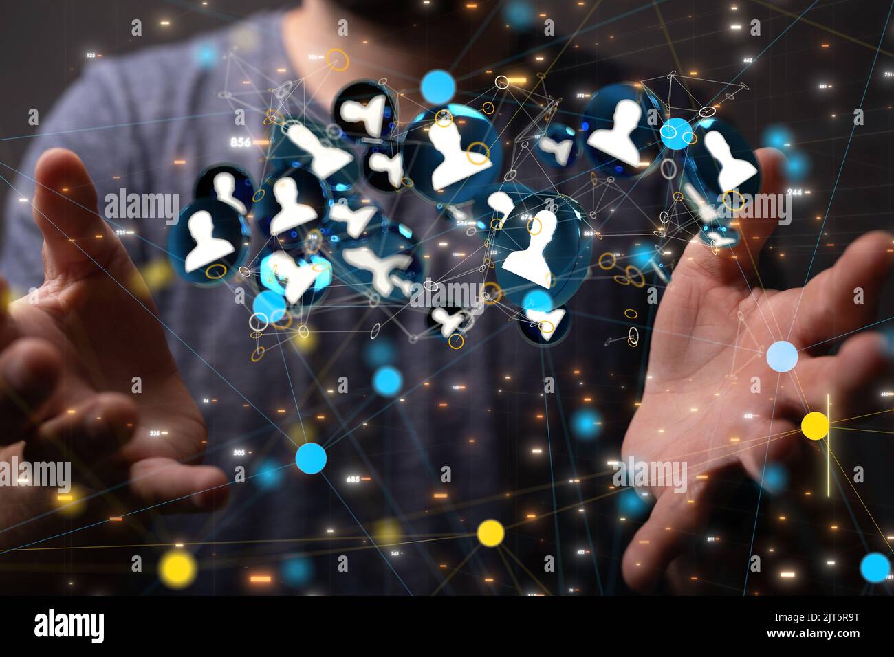 The 3d profile icons hovering between the man's hands Stock Photo - Alamy