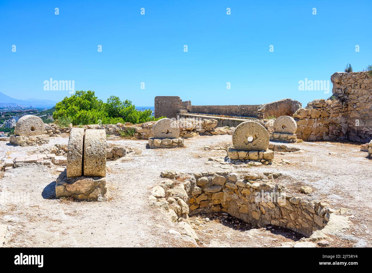 Stone wheels which are remains of an old bakery. The ruined medieval